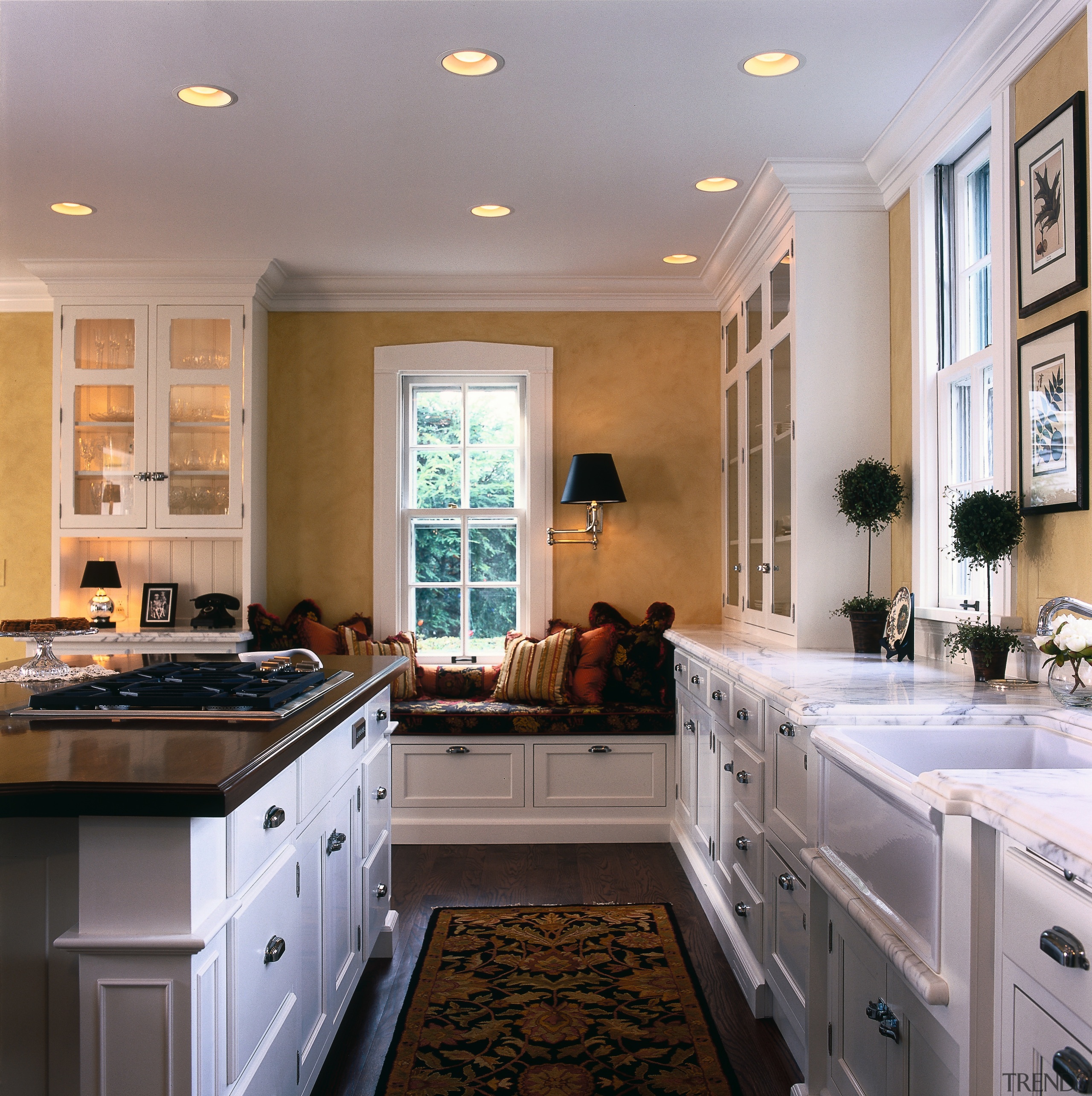 View of kitchen with white cabinetry and walnut cabinetry, ceiling, countertop, cuisine classique, floor, flooring, home, interior design, kitchen, room, window, gray