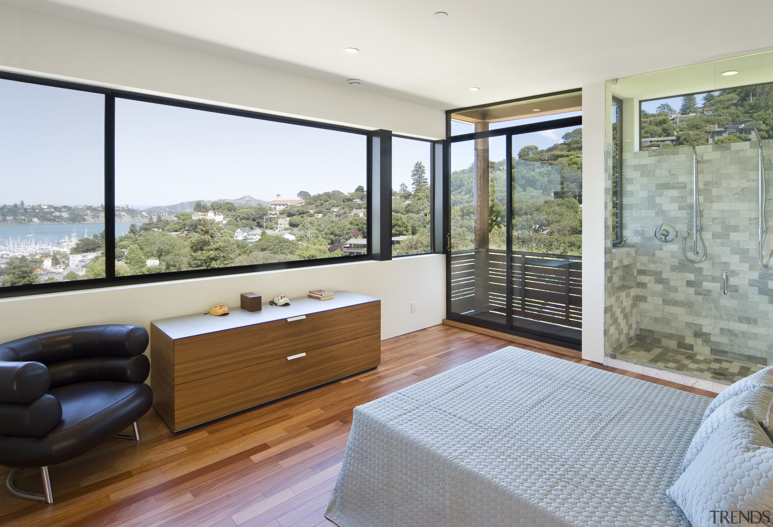 View of the master bedroom with wooden flooring, architecture, door, estate, floor, home, house, interior design, property, real estate, window, white