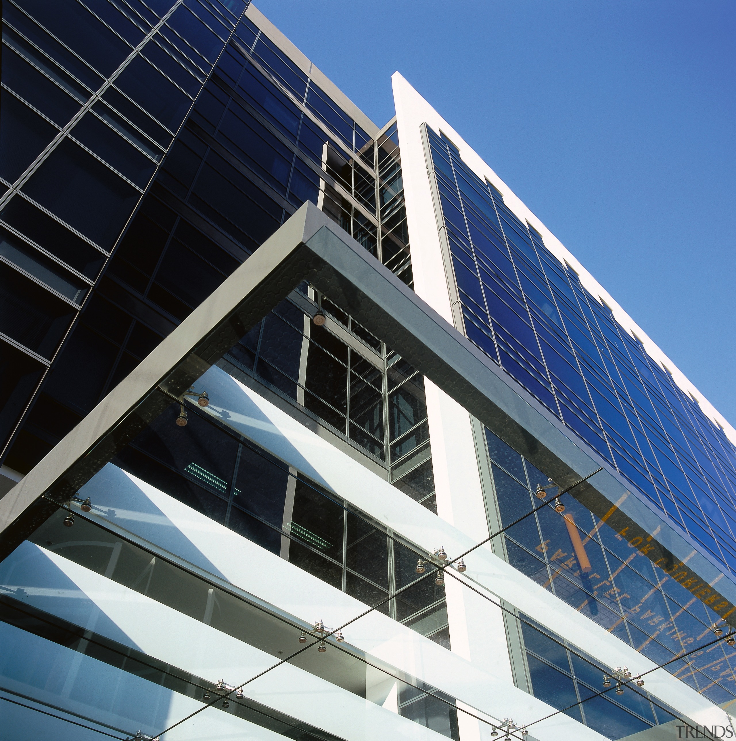 Exterior view of the TNT Australia building, large architecture, building, commercial building, condominium, corporate headquarters, daylighting, daytime, energy, facade, headquarters, metropolitan area, sky, skyscraper, black, blue