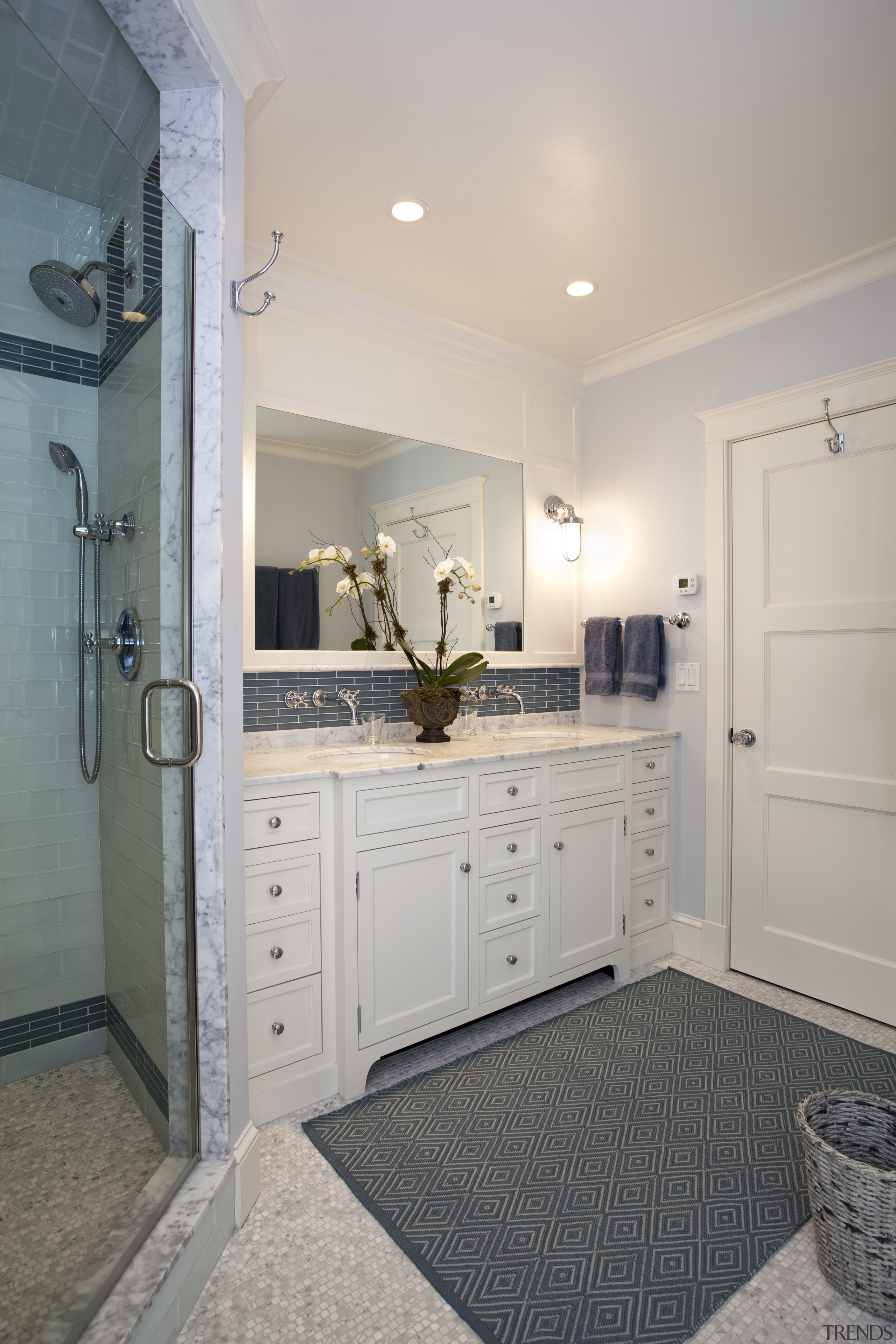 This family bathroom features painted wood cabinets with bathroom, cabinetry, countertop, floor, home, house, interior design, kitchen, room, gray