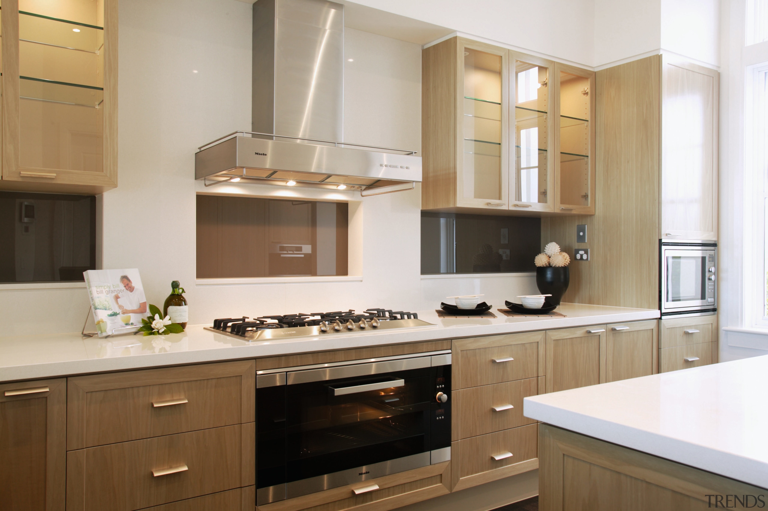 Kitchen with veneer cabinetry, large oven and cooktop, cabinetry, countertop, cuisine classique, interior design, kitchen, room, gray, brown