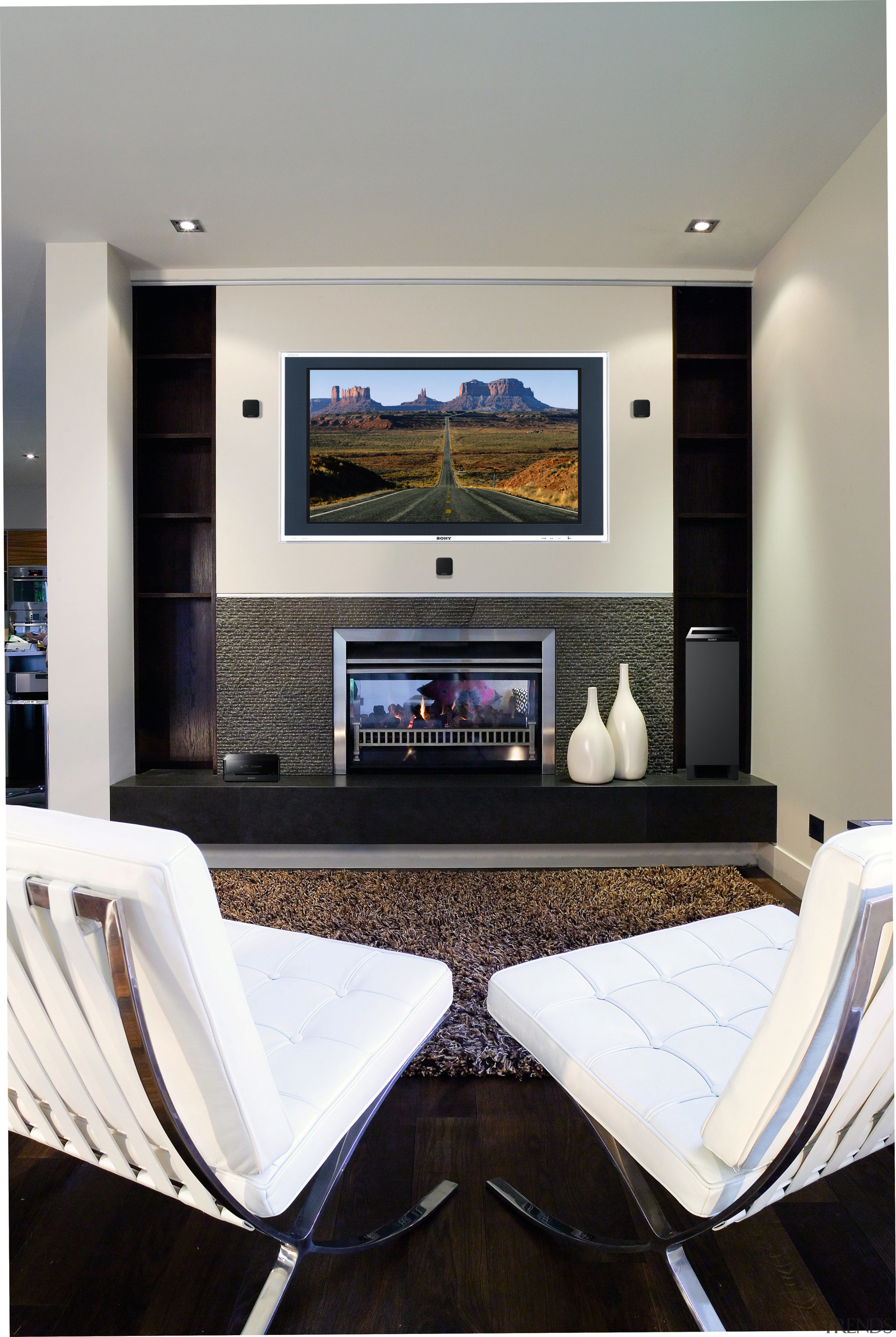 A view of a home theatre system from ceiling, furniture, home, interior design, living room, room, wall, white, black