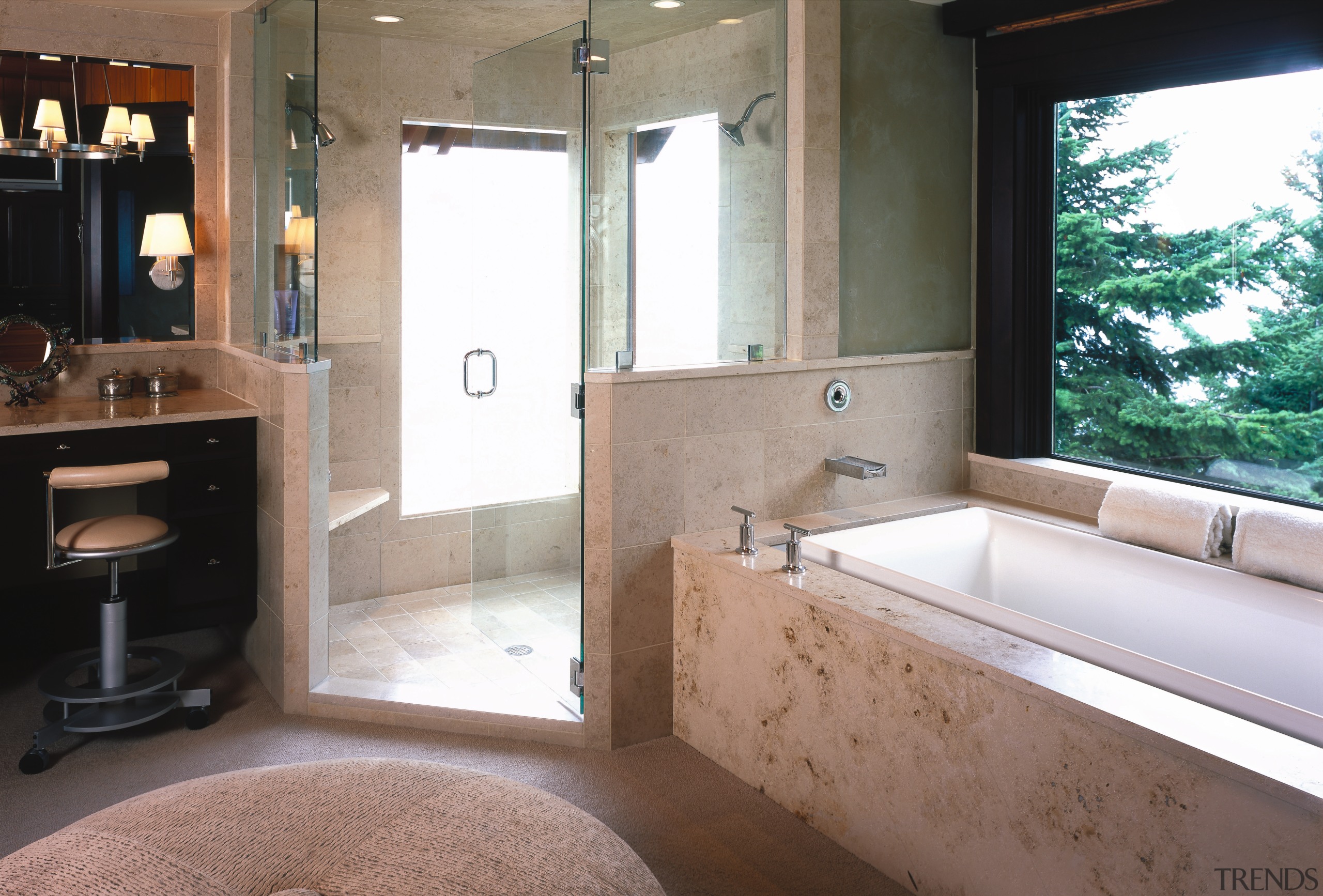 View of a bathroom, stone floor, large circular bathroom, floor, home, interior design, property, real estate, room, window, gray