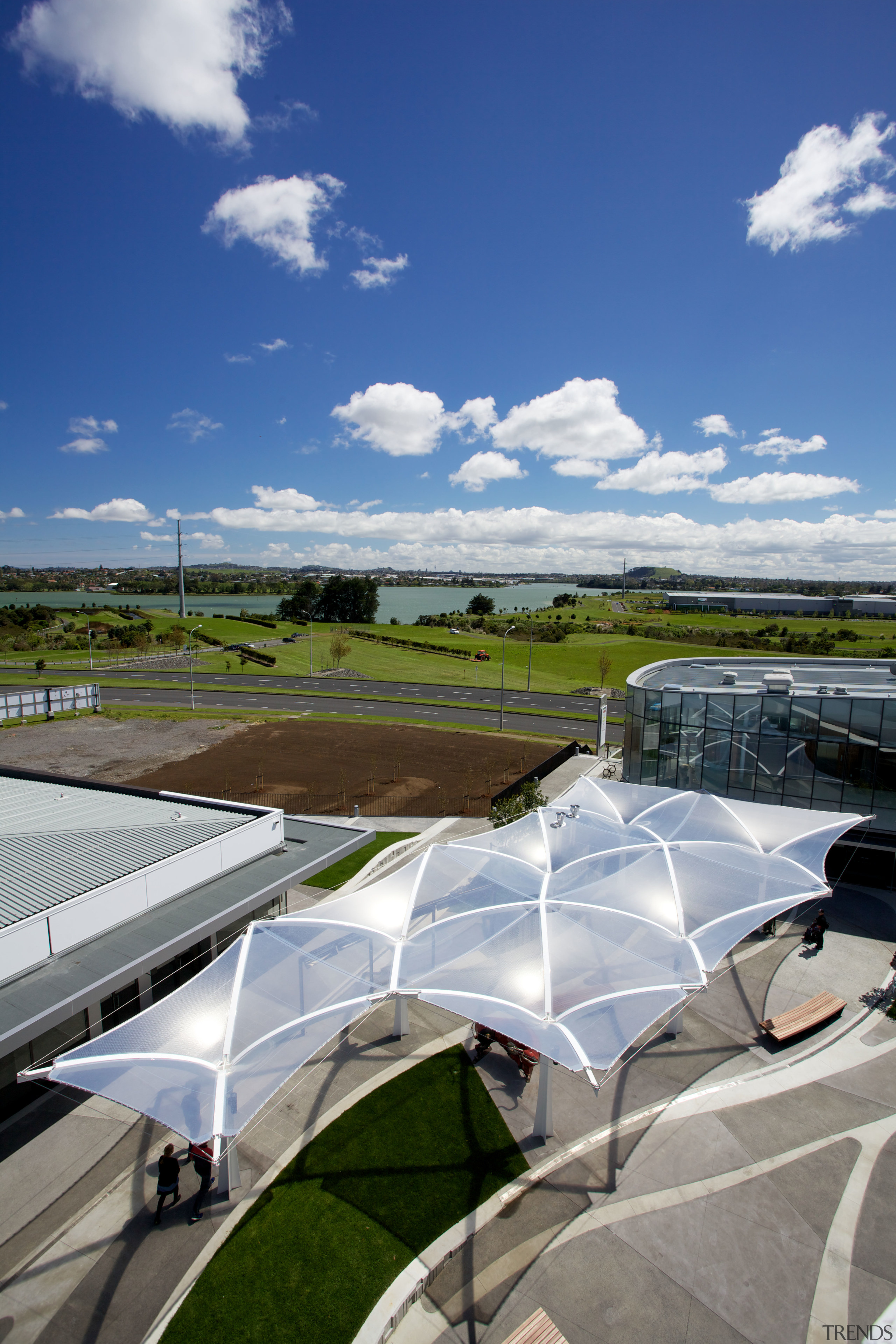 The soaring roof of the Kauwi Interpretive Centre architecture, cloud, energy, real estate, roof, sky, gray, blue