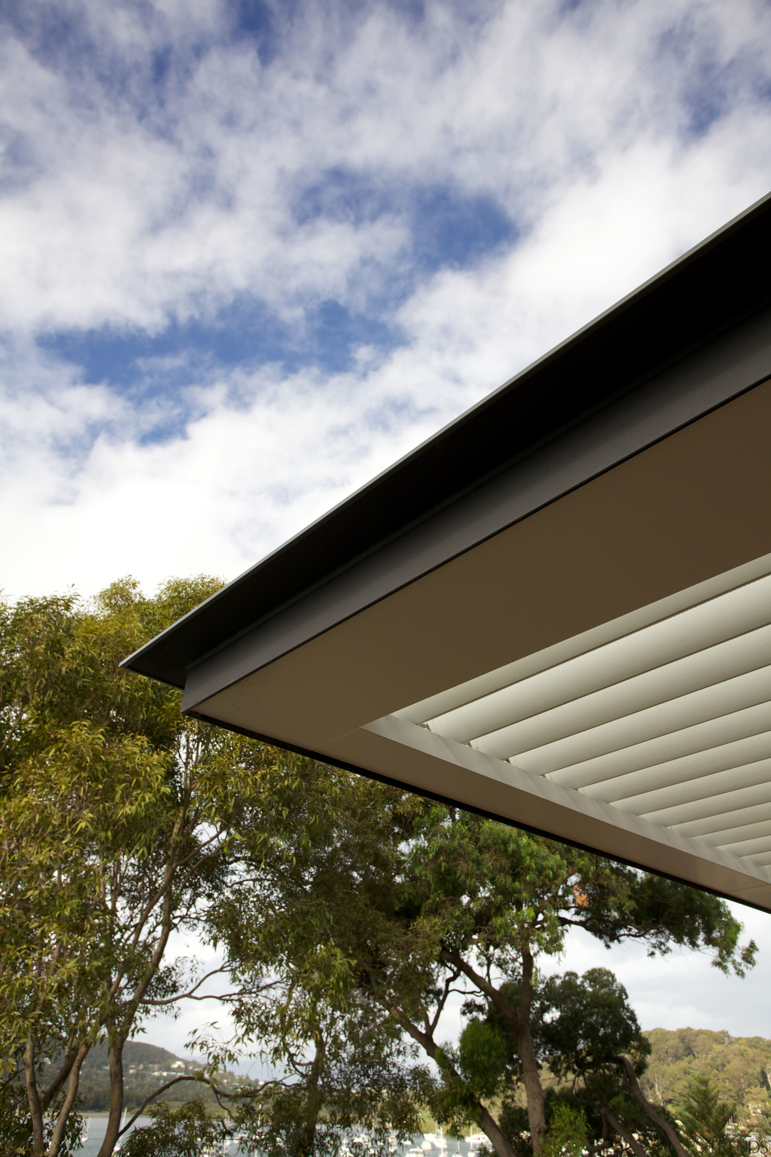 Cantilevered awning on contemporary home - Cantilevered awning architecture, cloud, daylighting, daytime, facade, home, house, residential area, roof, siding, sky, sunlight, tree, brown, gray