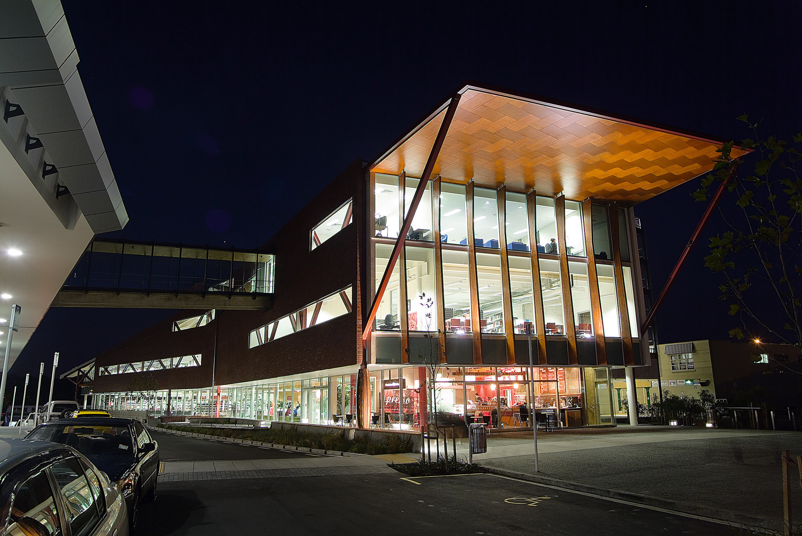 Night view of exterior of Waitakere Central Library architecture, building, city, facade, metropolis, metropolitan area, mixed use, night, sky, structure, black