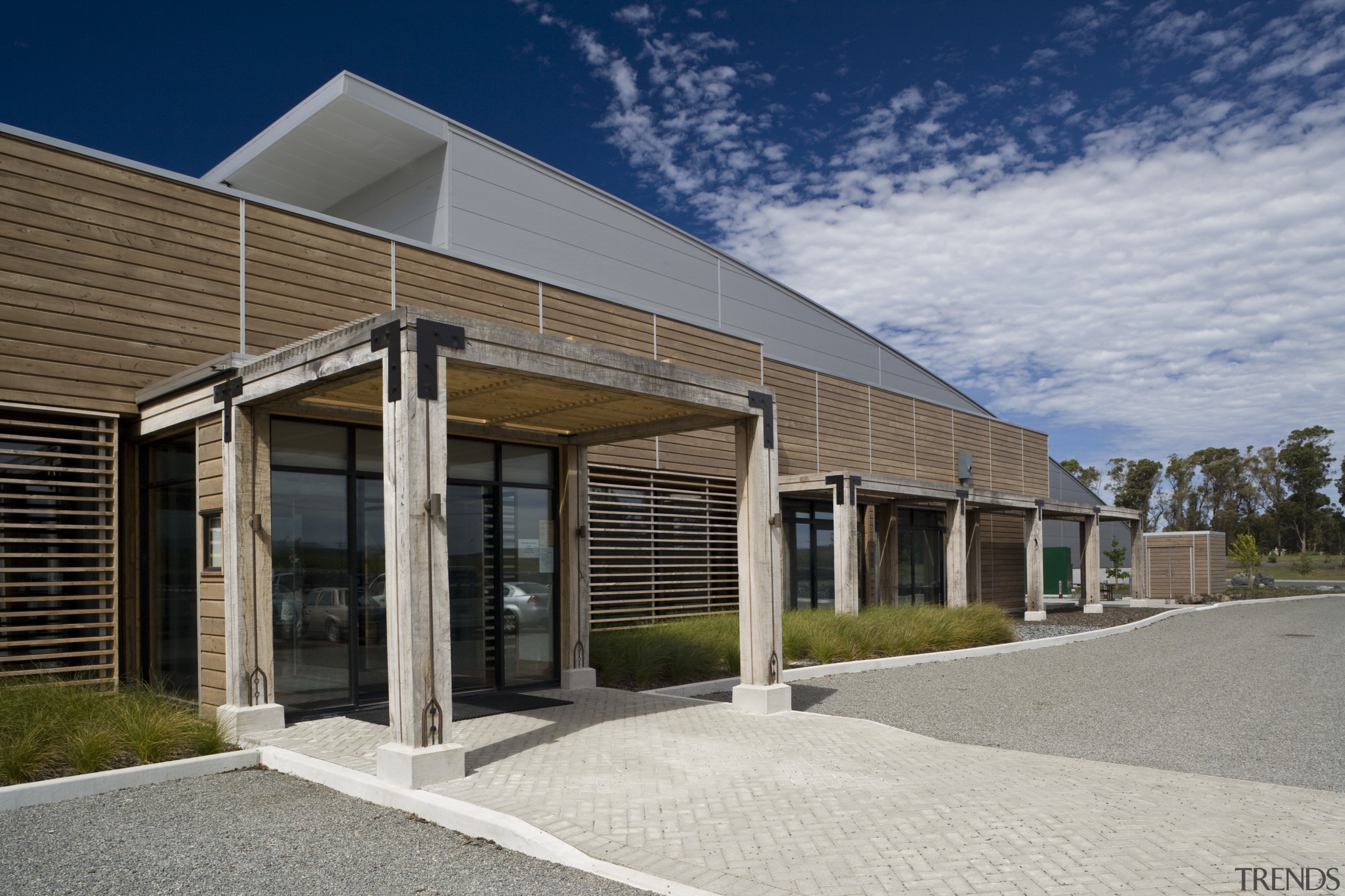 Exterior view of the entrance to the winery architecture, building, commercial building, corporate headquarters, facade, home, house, property, real estate, residential area, gray
