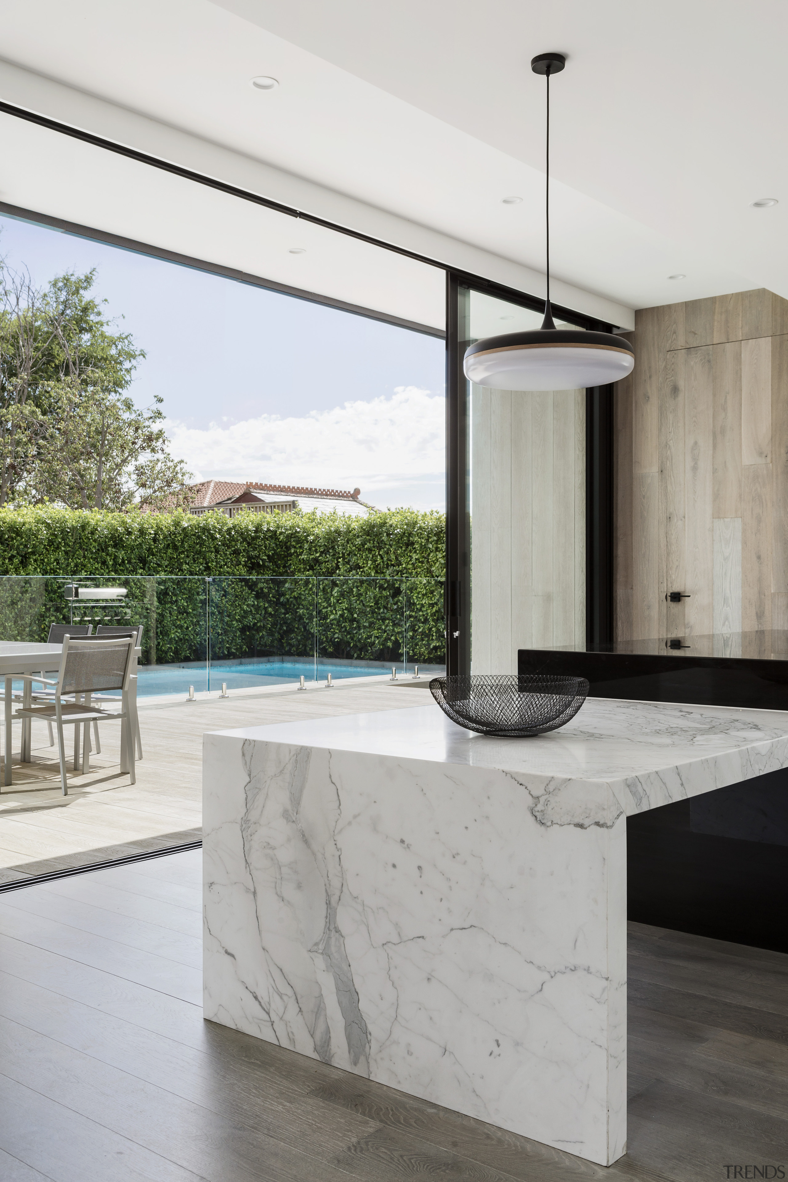 ​​​​​​​Dark granite for the main benchtop is matched architecture, countertop, benchtop, home, house, interior design, Island, Marble, indoor outdoor flow, LSA Architects