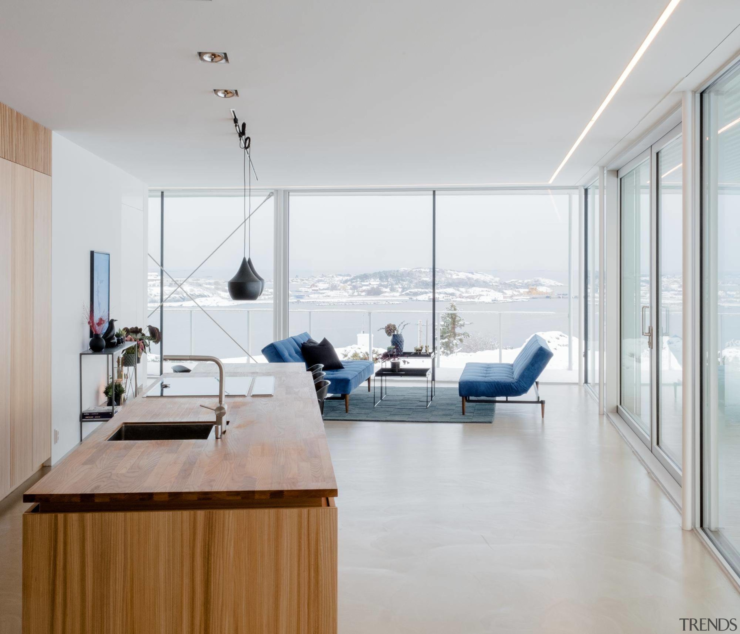 A comfortable living room faces out to the architecture, floor, house, interior design, gray, white