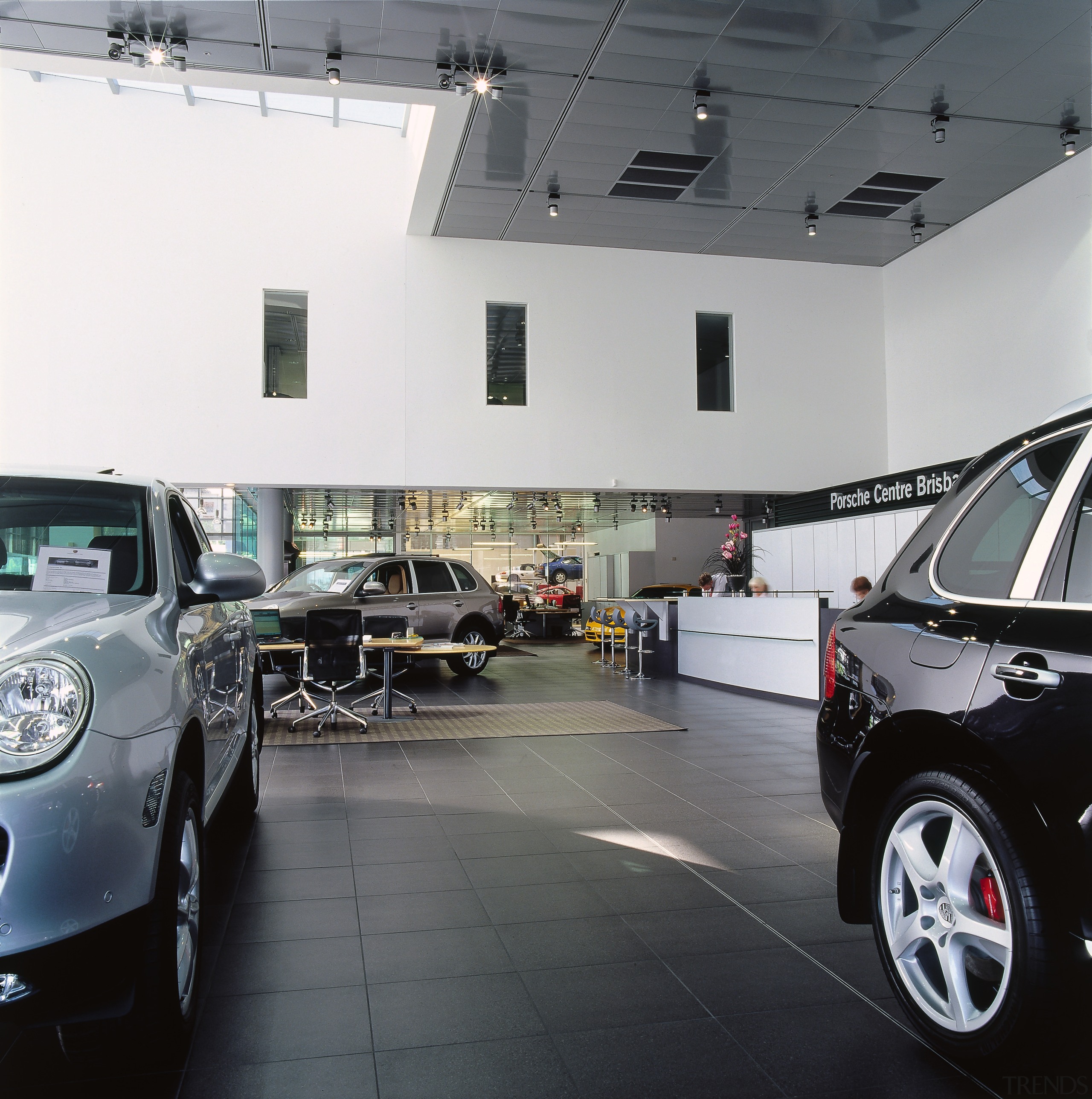 view of the warehouse area - view of automobile repair shop, automotive design, automotive exterior, building, car, car dealership, executive car, family car, luxury vehicle, mid size car, motor vehicle, personal luxury car, sport utility vehicle, technology, vehicle, gray, black