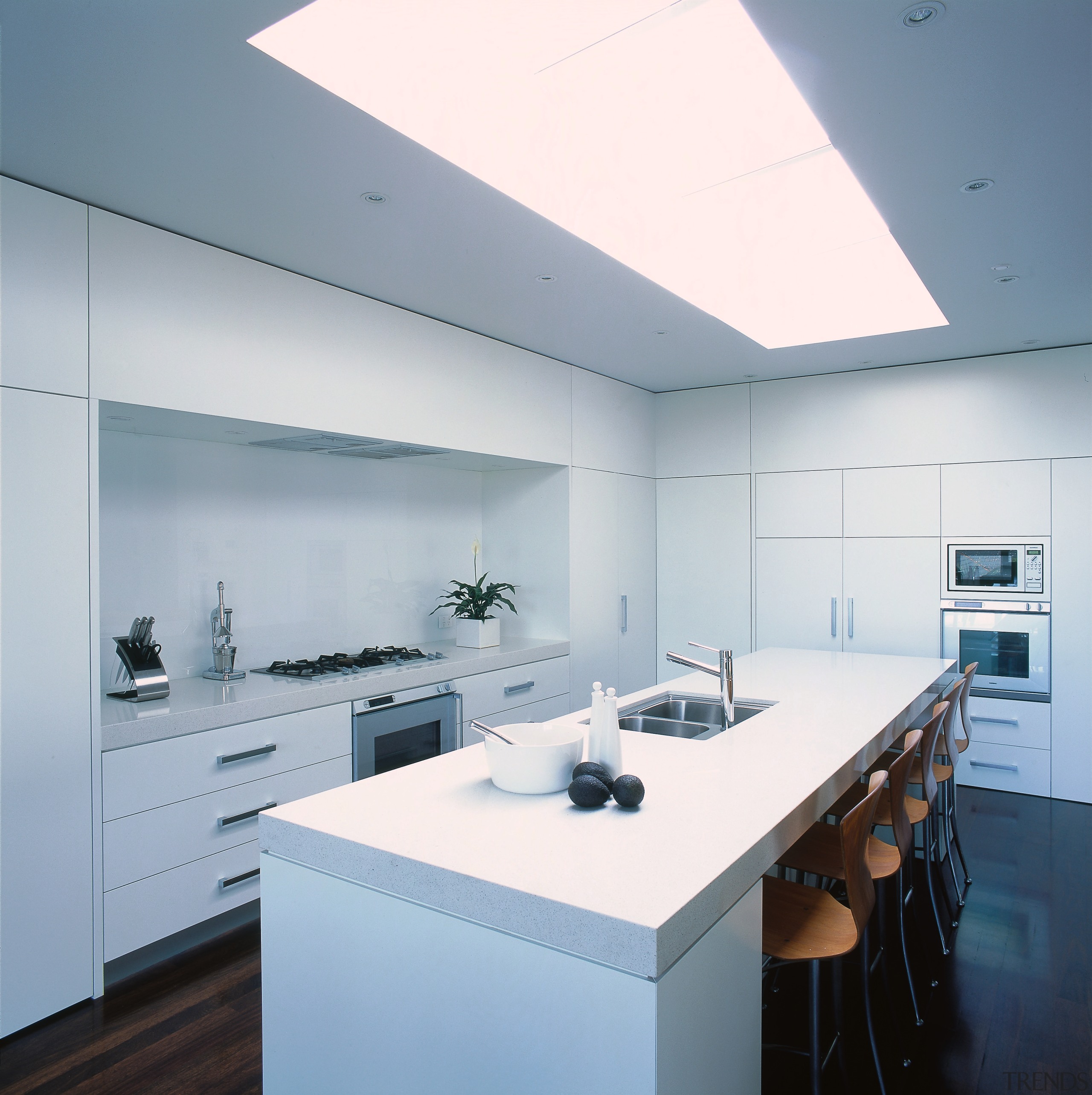 View of a kitchen area, wooden flooring and architecture, ceiling, countertop, daylighting, interior design, kitchen, product design, gray