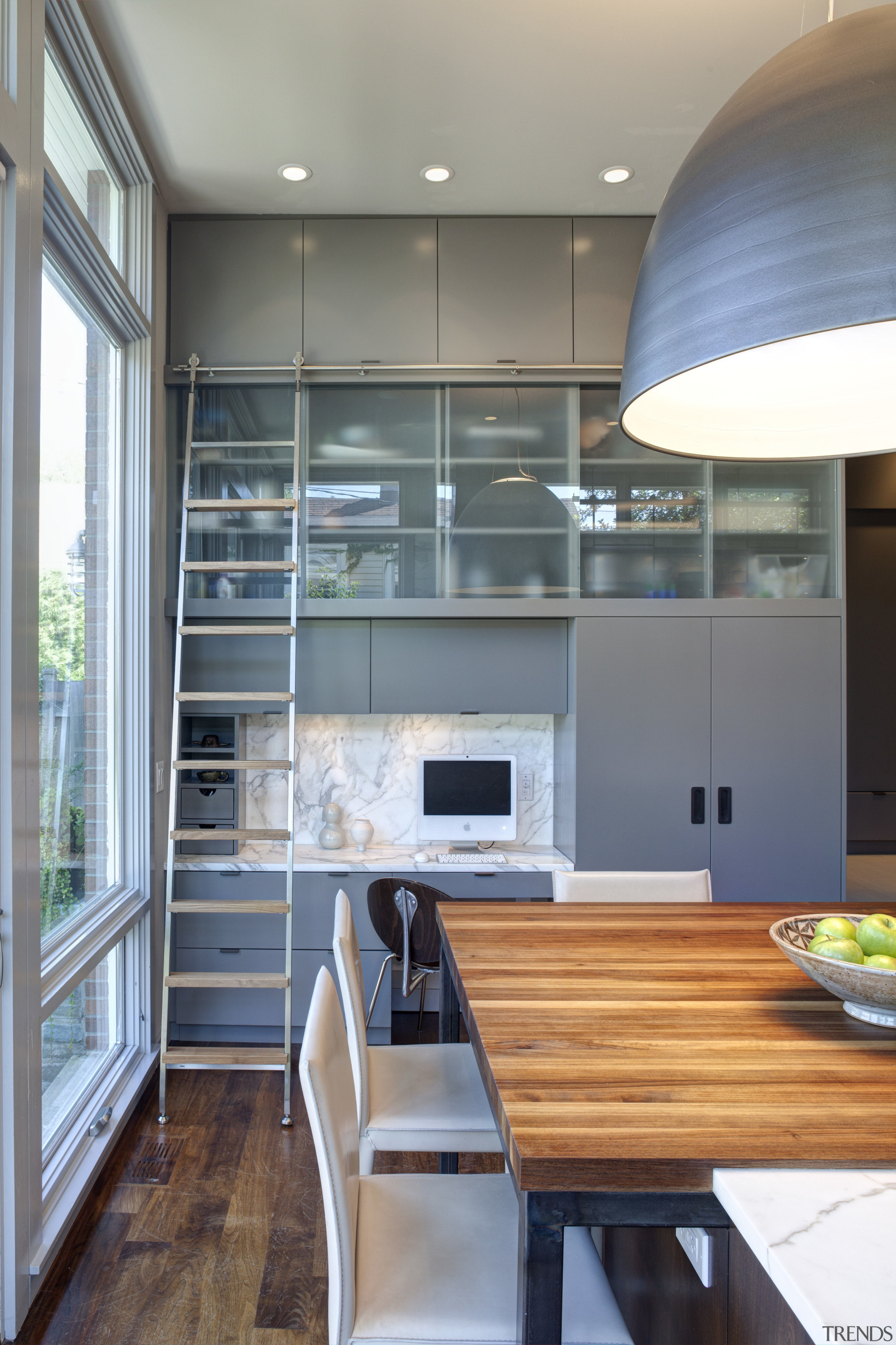 This layered kitchen features sliding stainless steel and countertop, interior design, kitchen, gray