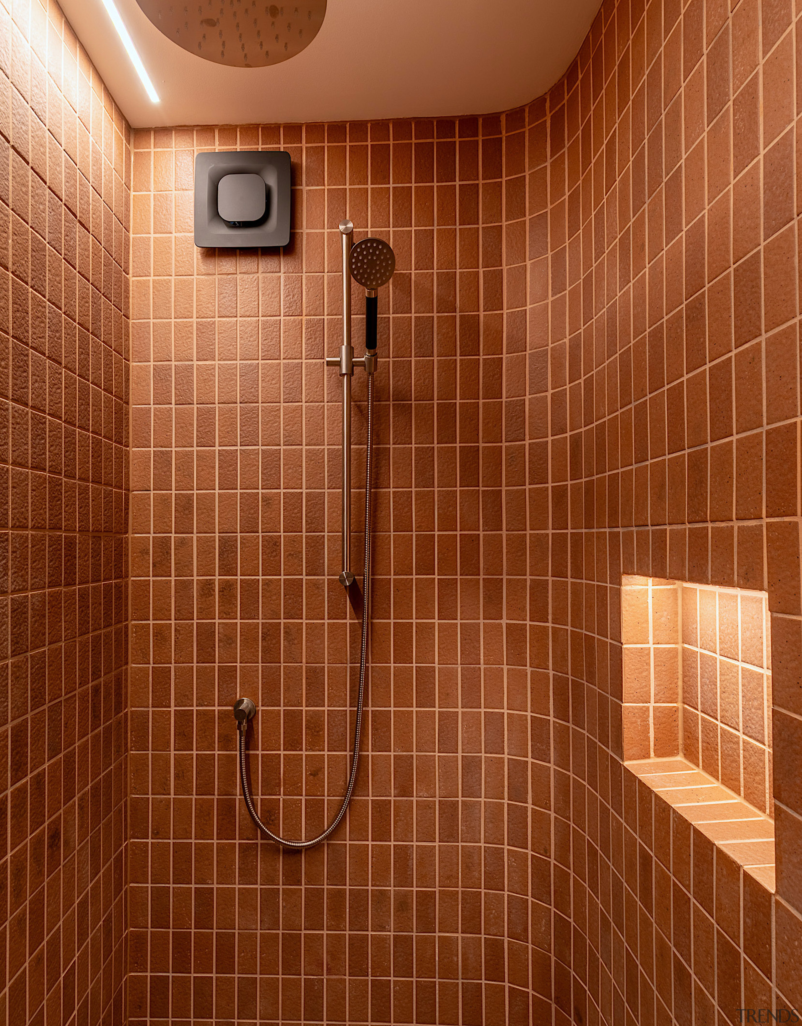 Both shower and adjacent sauna feature a timber-lined 