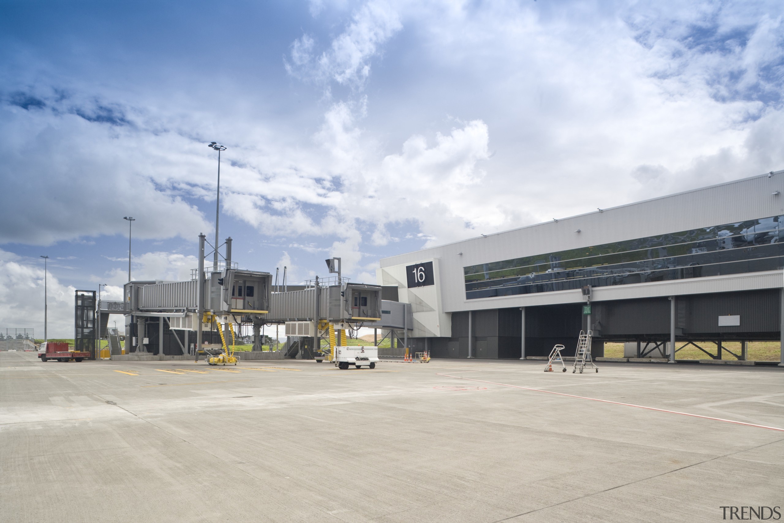 All lighting and power installation at the new airport, airport terminal, asphalt, corporate headquarters, infrastructure, real estate, sky, gray, white