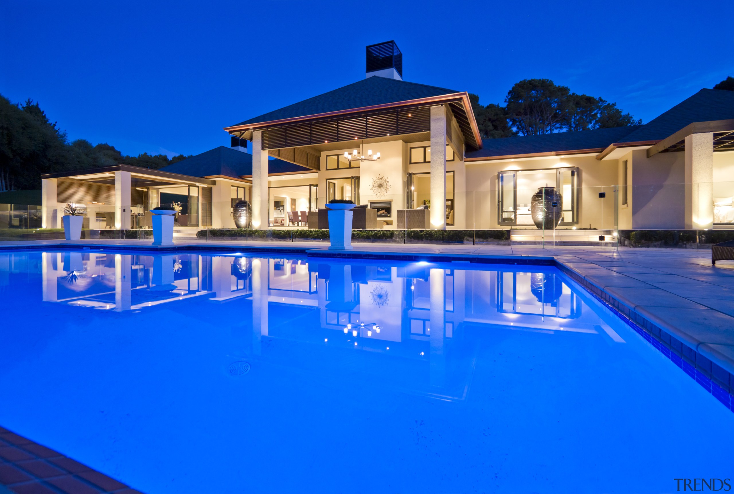 View of large country property with easy connection blue, estate, home, hotel, house, leisure, lighting, mansion, property, real estate, reflection, resort, resort town, sky, swimming pool, villa, water, blue