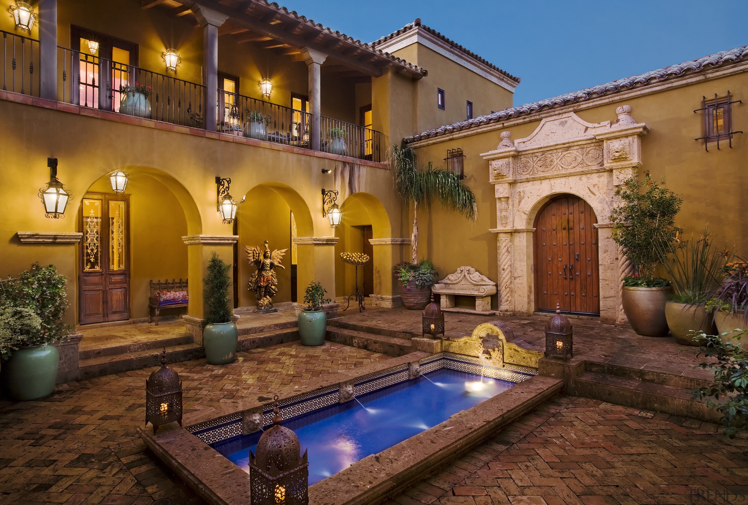 Image of the exterior of this new home. courtyard, estate, hacienda, home, property, real estate, swimming pool, villa, brown