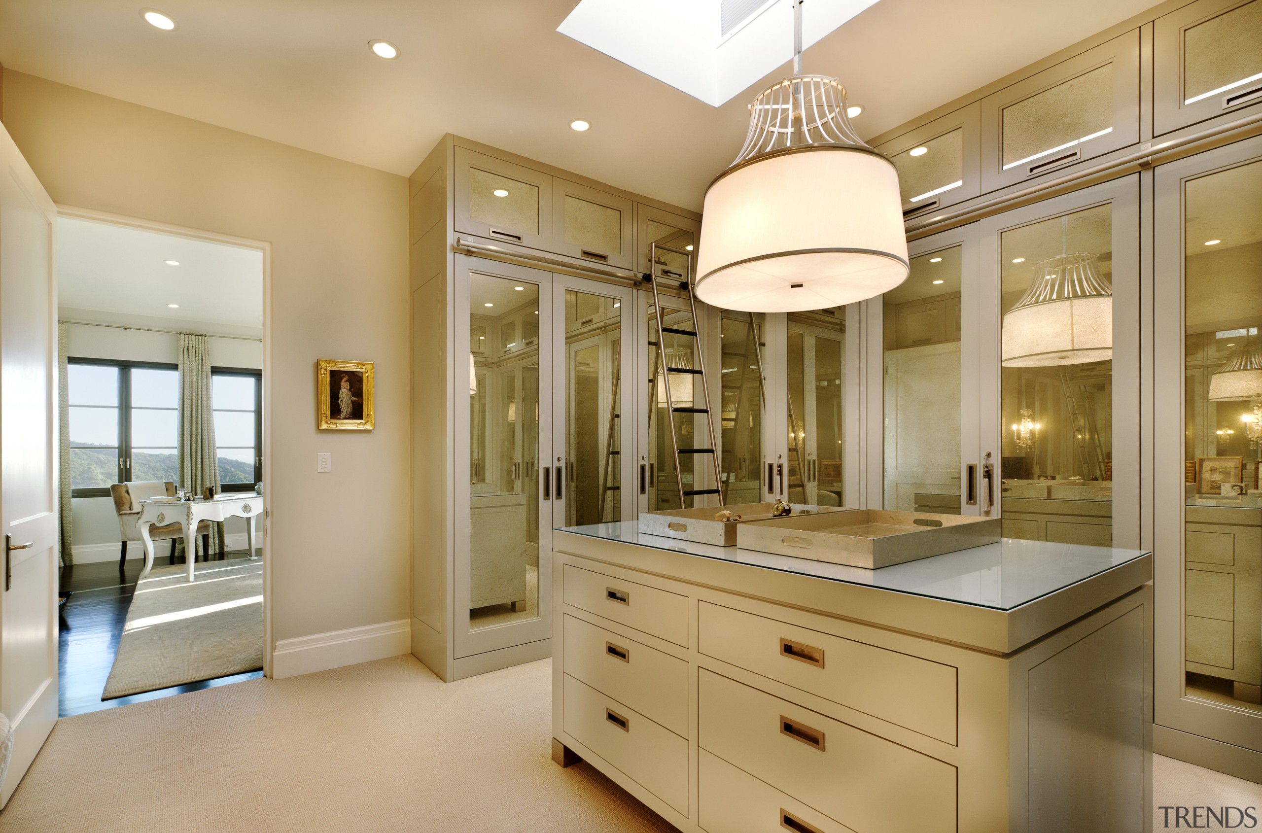 View of dressing room that features cupboards with cabinetry, ceiling, countertop, cuisine classique, home, interior design, kitchen, room, orange, brown