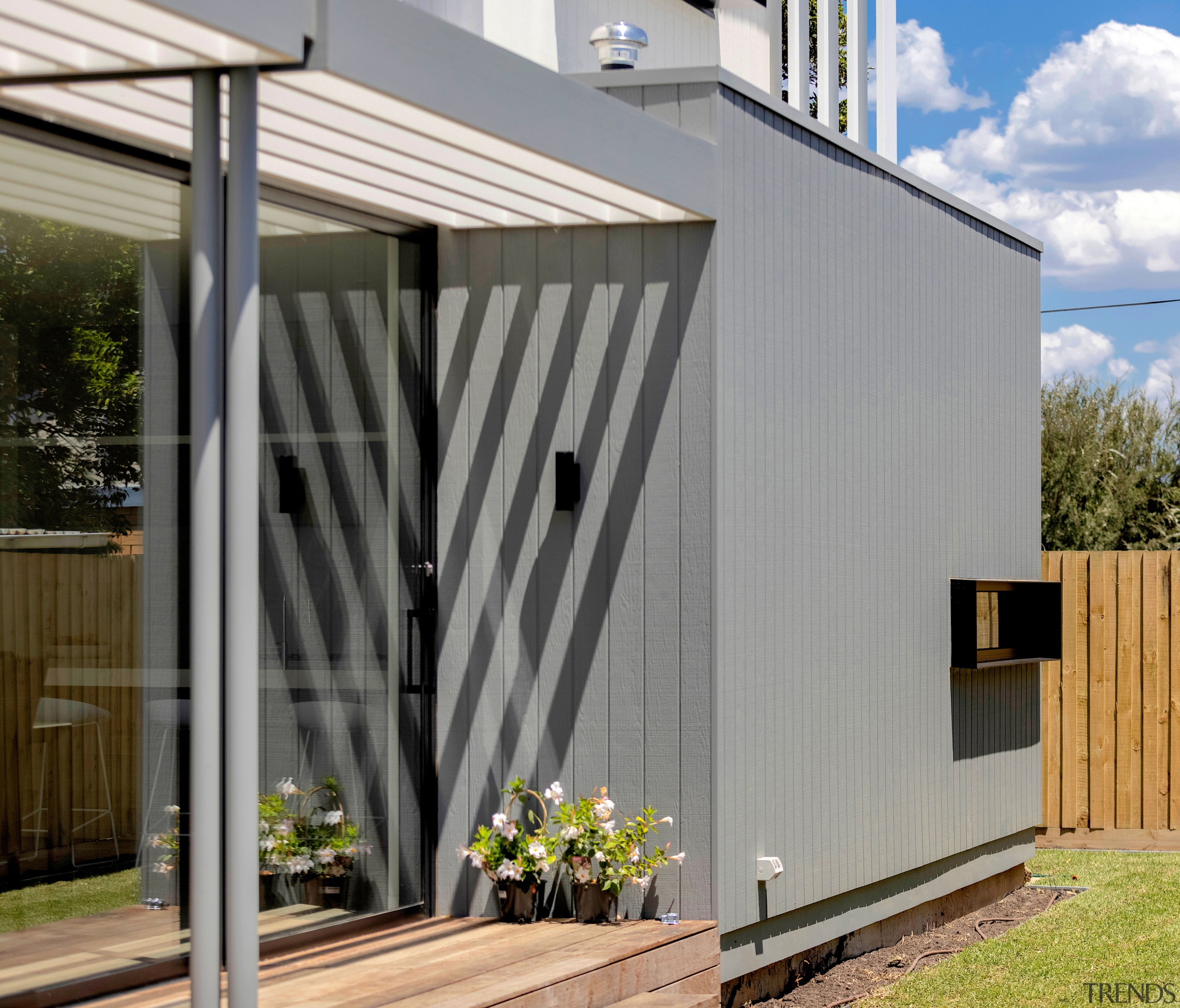 Rear deck detail. - Under the spreading cedar 