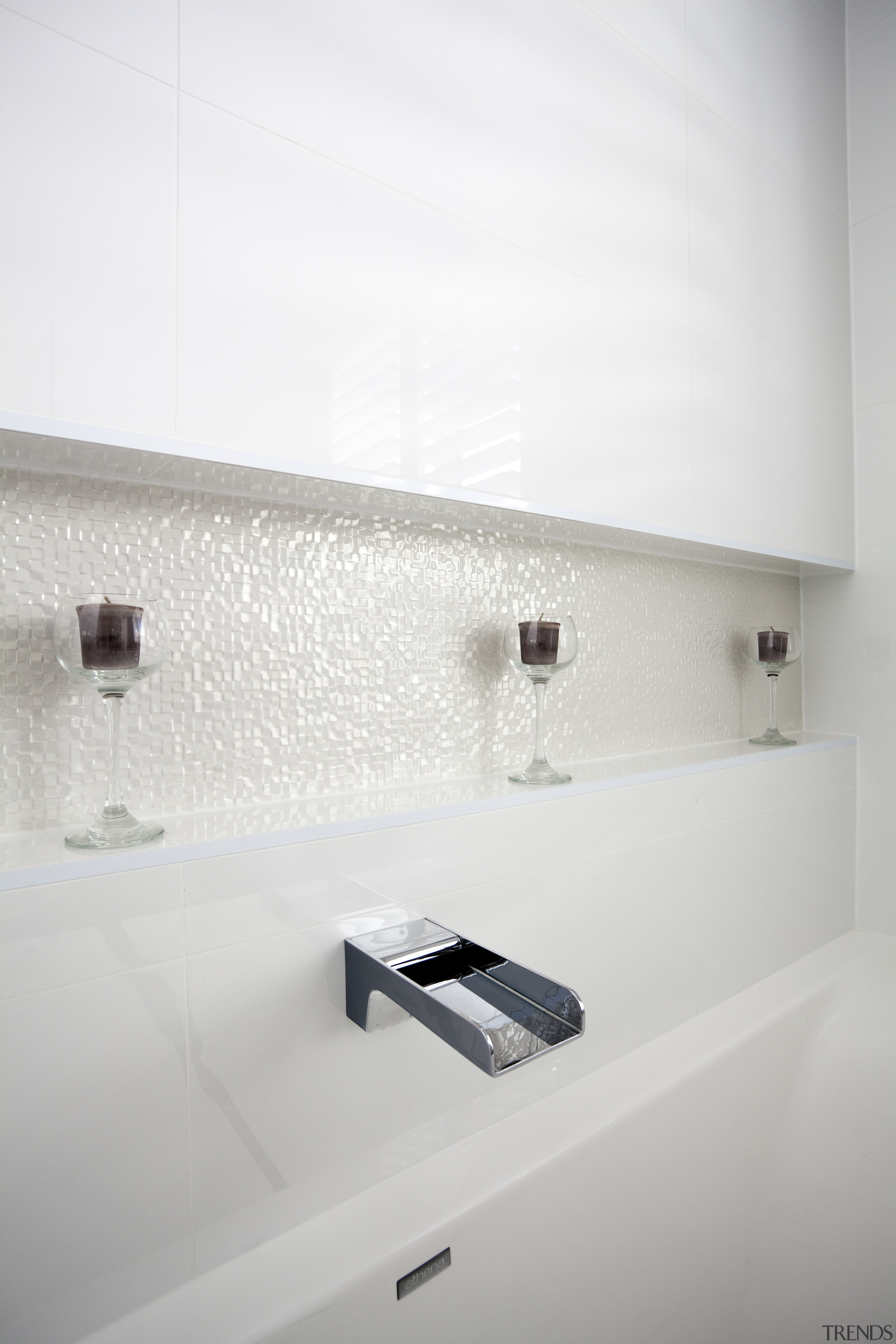 Close up of tap. - Close up of bathroom, floor, interior design, plumbing fixture, product design, sink, tap, tile, wall, white