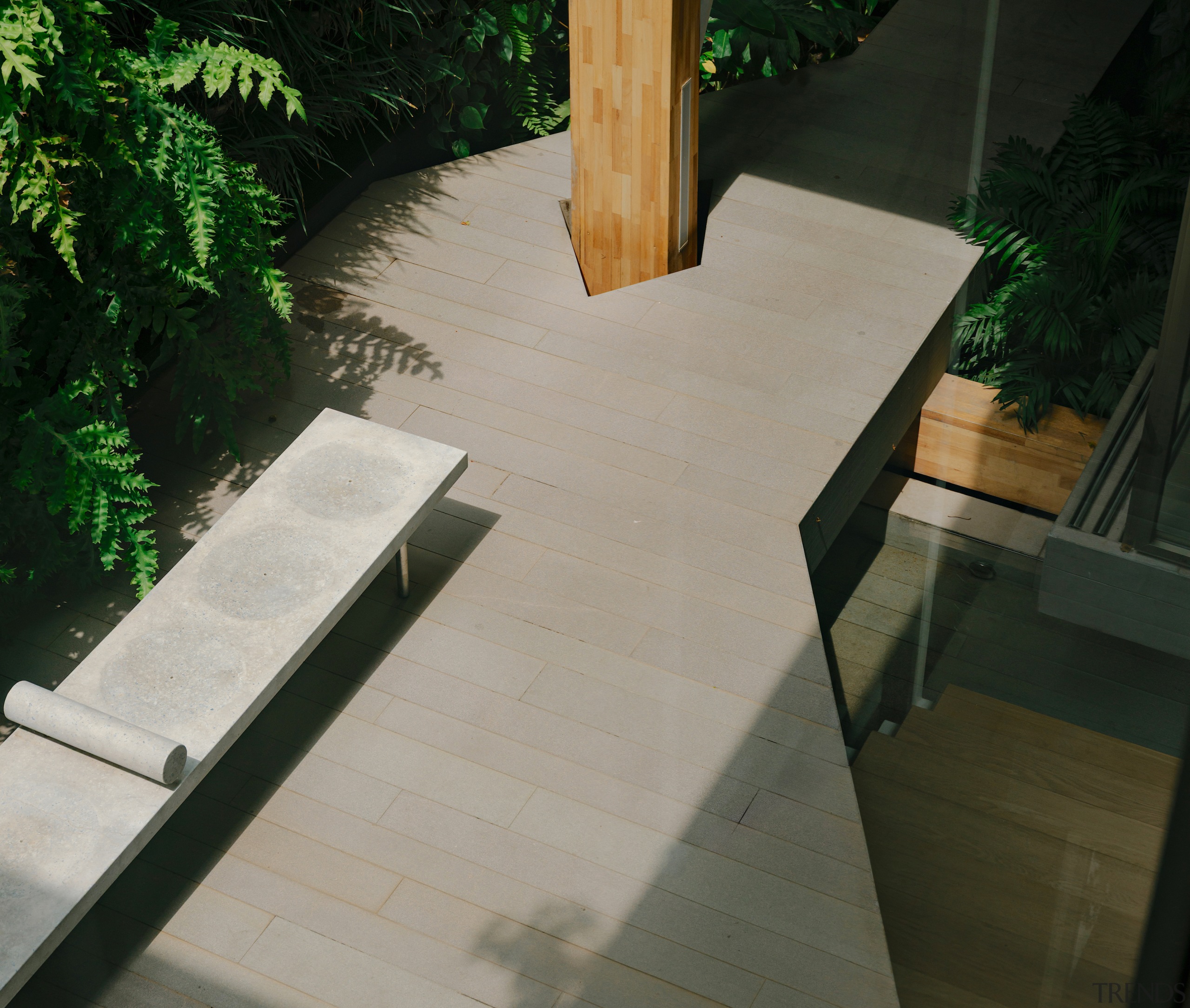 Rear deck punctuated by glulam element. - Walk 