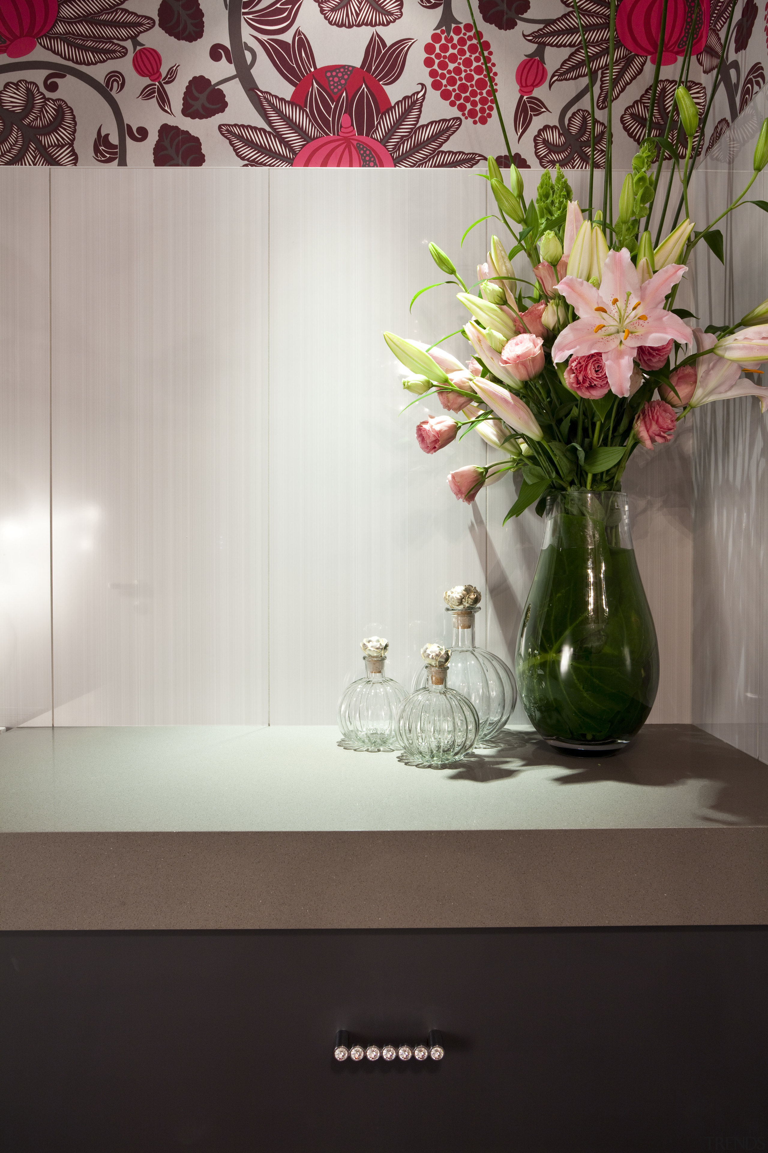 Bathroom vanity with grey benchtop and vase of artificial flower, cut flowers, flora, floral design, floristry, flower, flower arranging, flower bouquet, flowerpot, interior design, petal, plant, still life photography, vase, gray