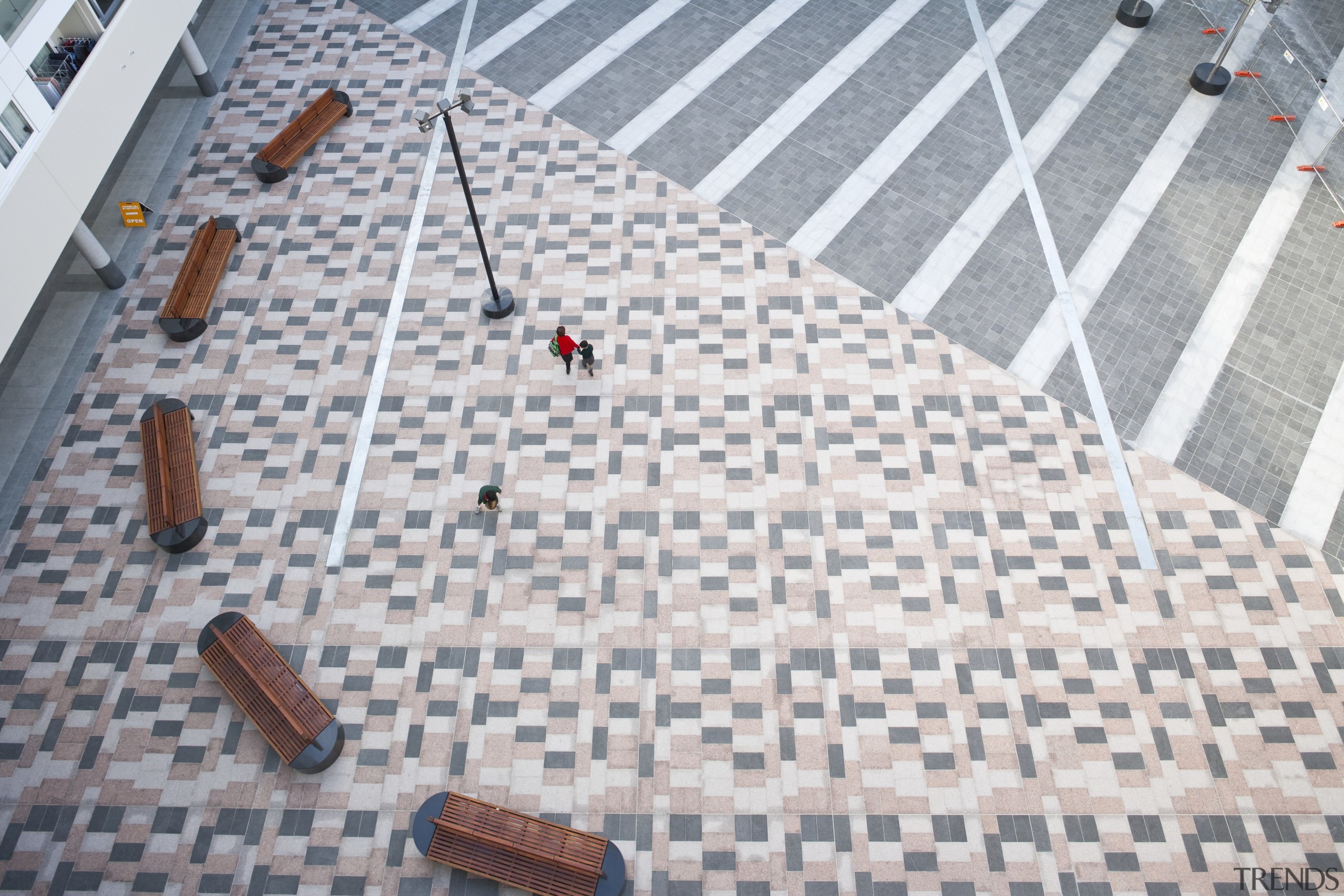 External view of kings square development. Tiling supplied floor, flooring, line, road surface, roof, sidewalk, structure, gray, white