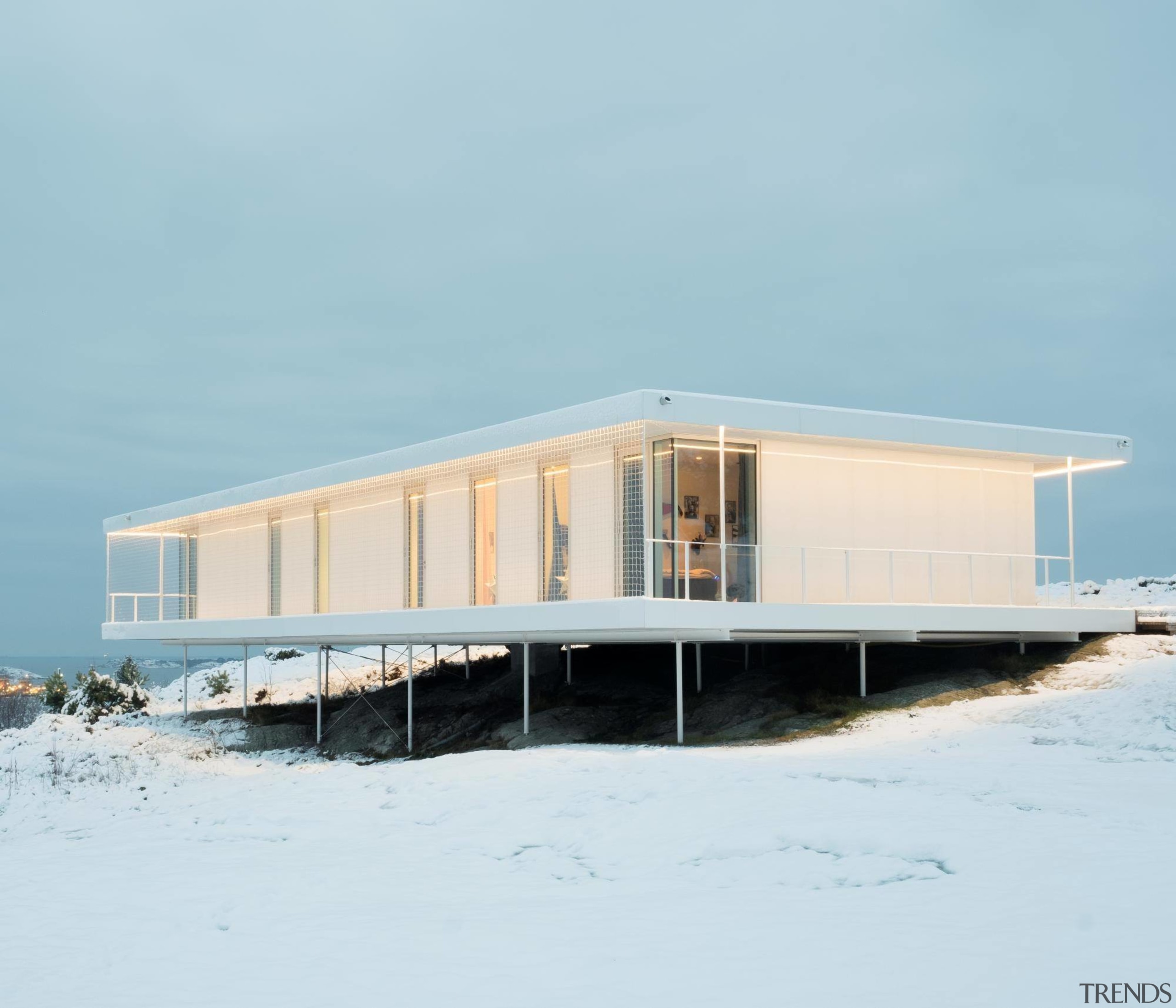 A view of the home showing off the architecture, home, house, shed, sky, snow, structure, winter, gray