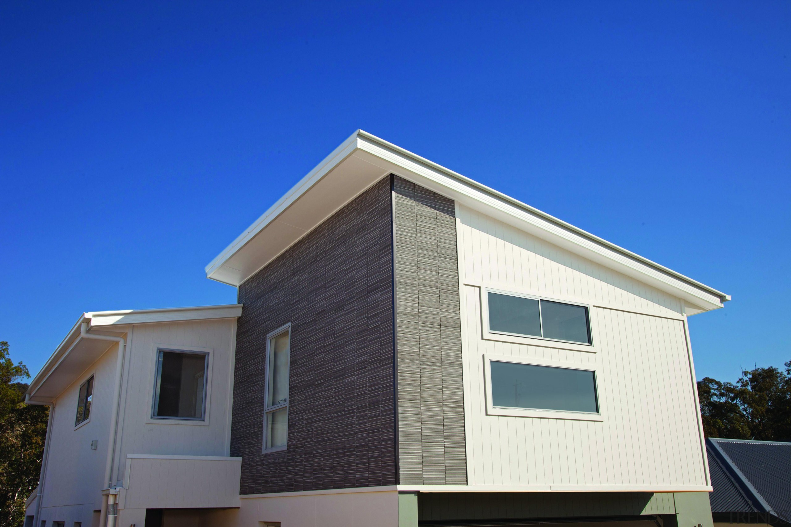 With a depth of colour and intricate texture architecture, building, commercial building, daylighting, elevation, facade, home, house, property, real estate, residential area, roof, siding, sky, window, blue