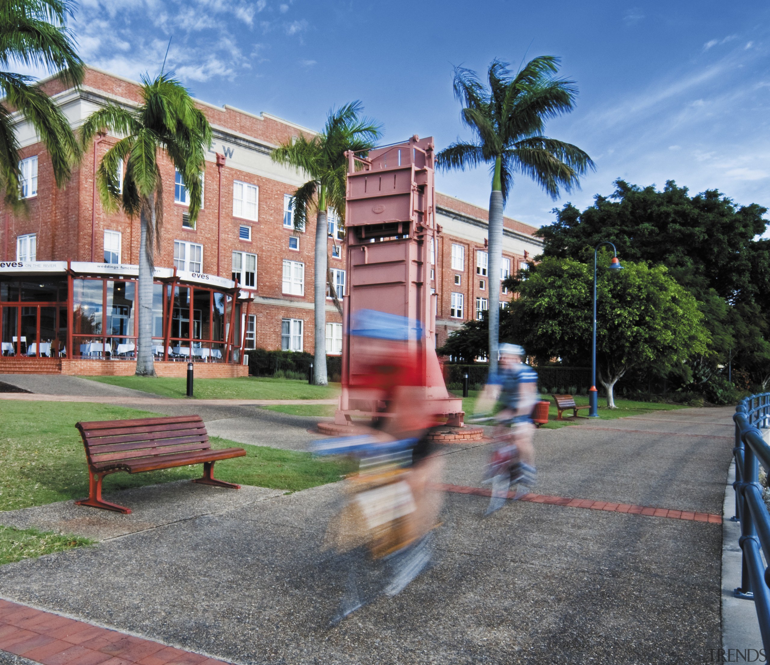 Image of a development which is part of arecales, city, condominium, leisure, neighbourhood, palm tree, plant, real estate, recreation, residential area, sky, tree, walkway, water, gray