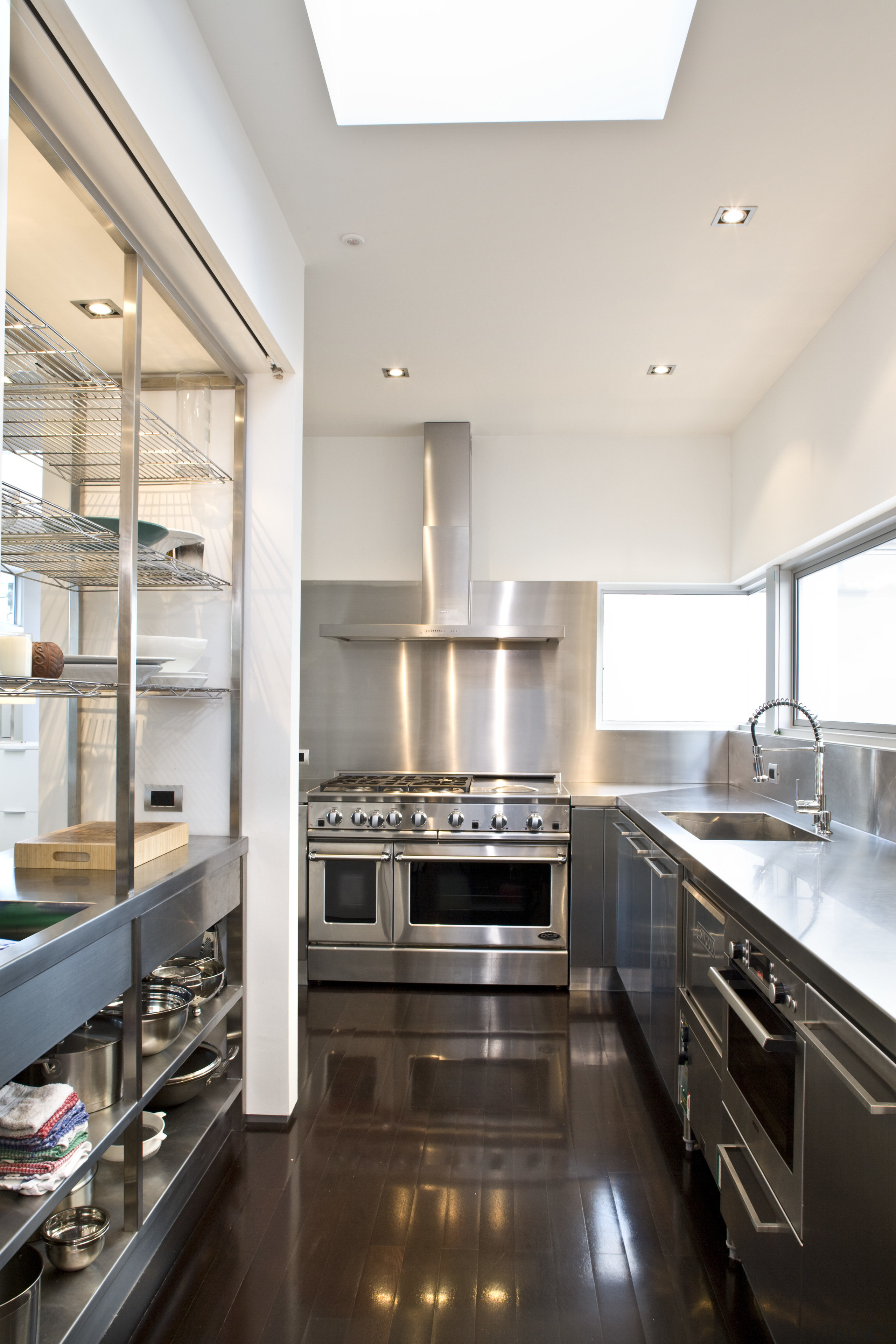 Image of the kitchen and the dining room cabinetry, countertop, cuisine classique, floor, interior design, kitchen, room, white