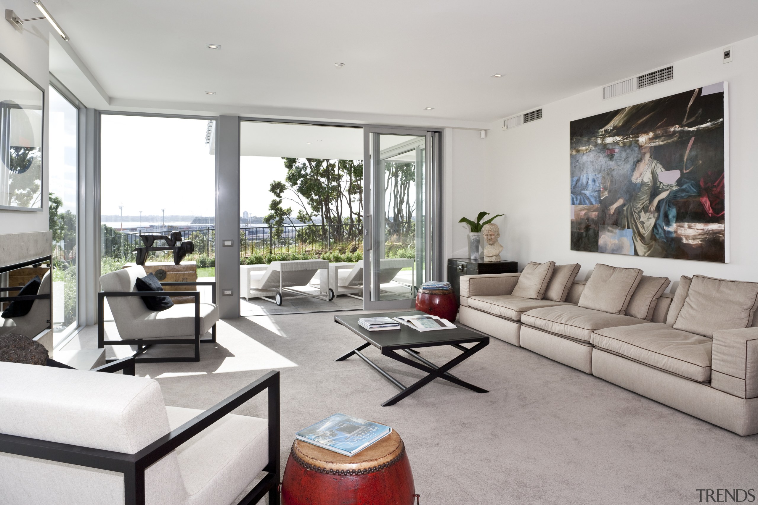 View of the open plan living area featuring house, interior design, living room, property, real estate, window, gray