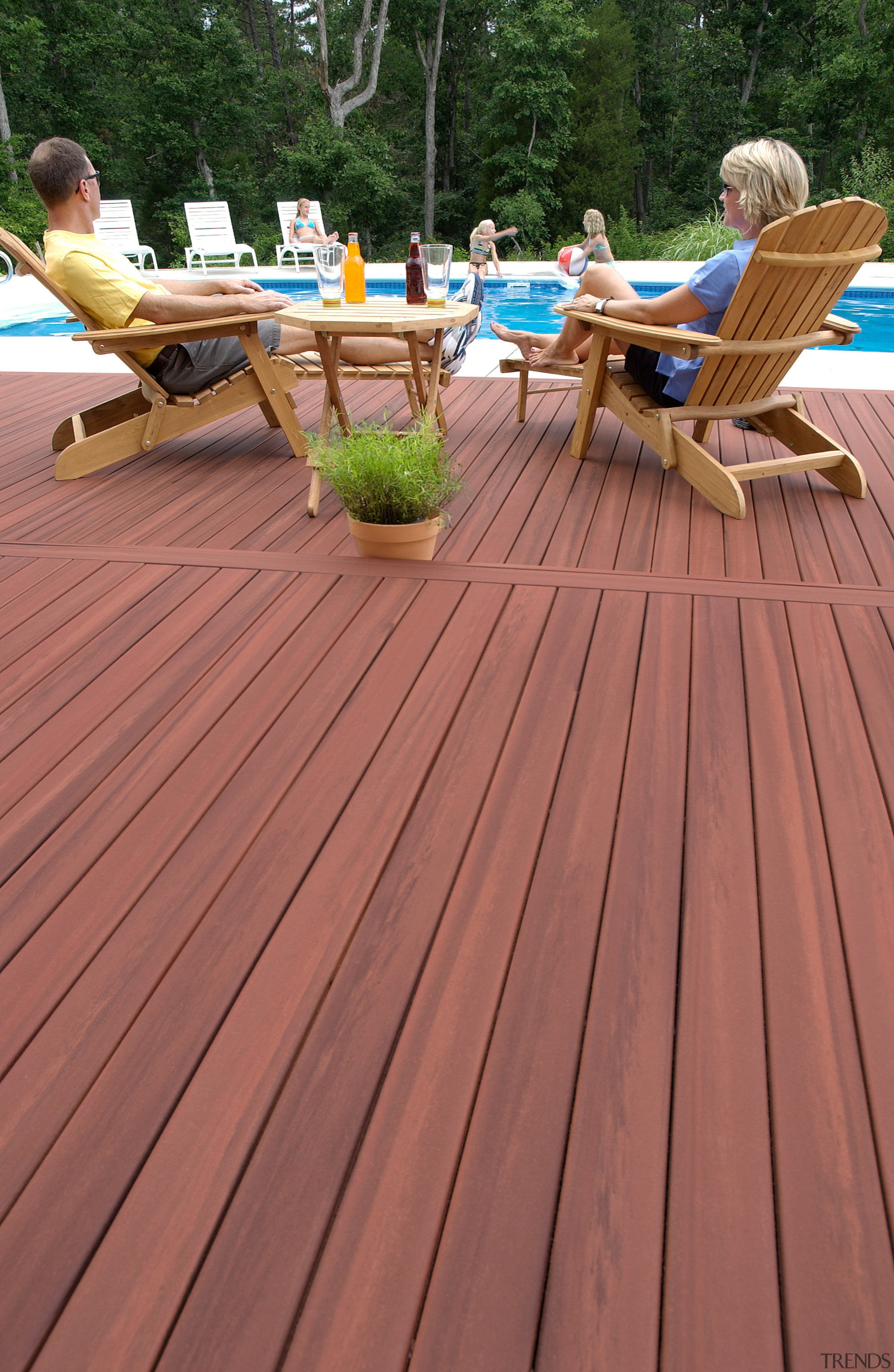 View of products from WeatherBest Decking &amp; Railing. deck, floor, flooring, garapa, hardwood, laminate flooring, outdoor furniture, outdoor structure, sunlounger, table, wood, wood flooring, wood stain, red