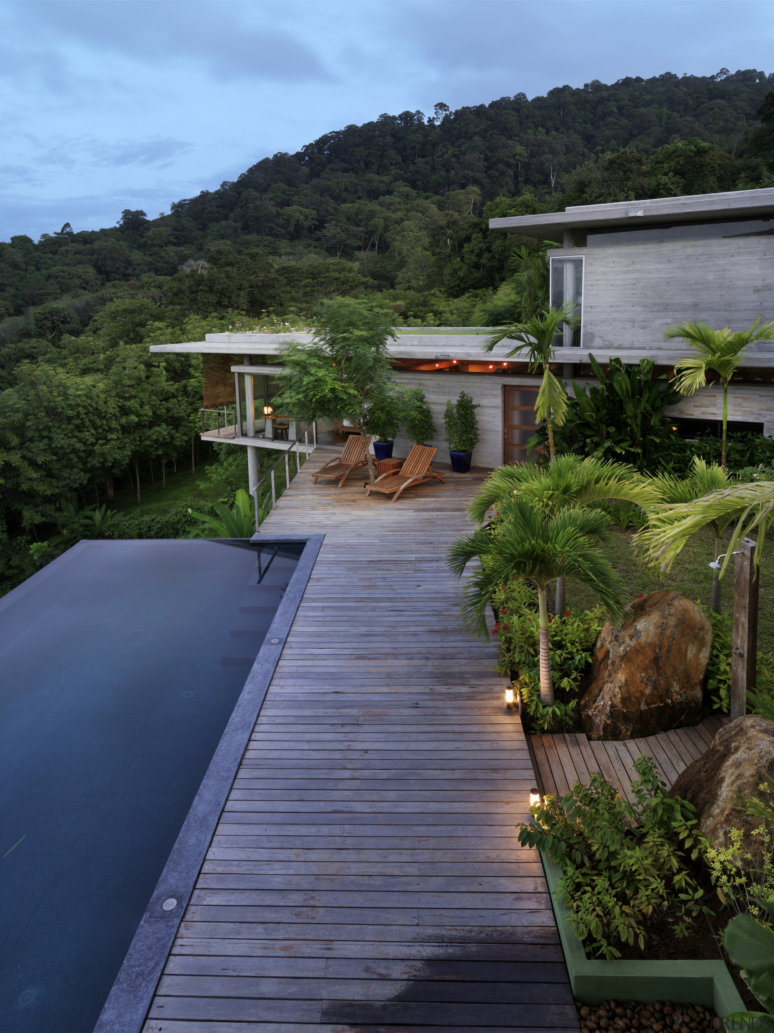 View of modern home designed by Design Unit architecture, cottage, estate, house, landscape, leisure, nature, plant, real estate, reflection, reservoir, sky, tree, walkway, water, wood