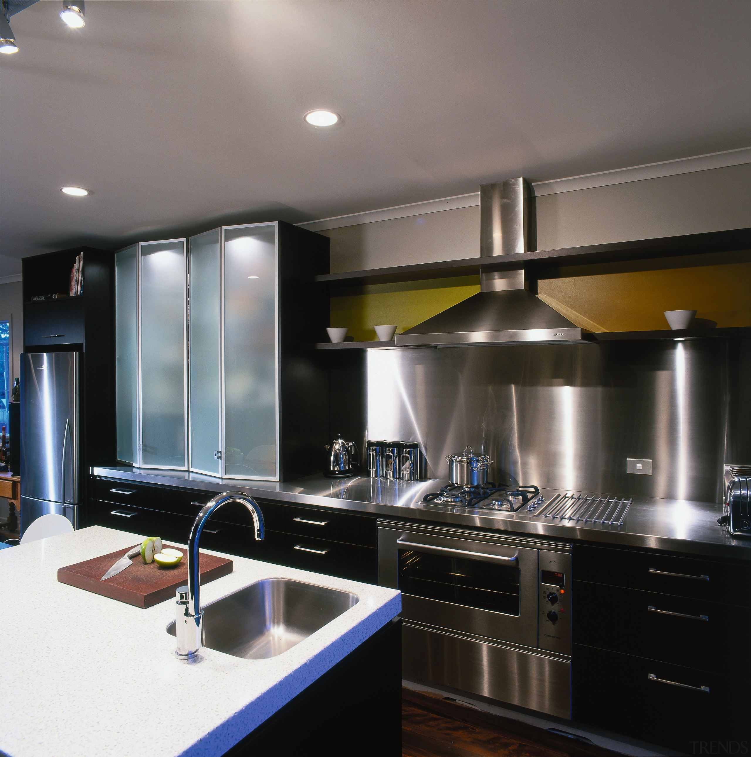 Kitchen with white benchtop on island with sink, countertop, interior design, kitchen, gray, black