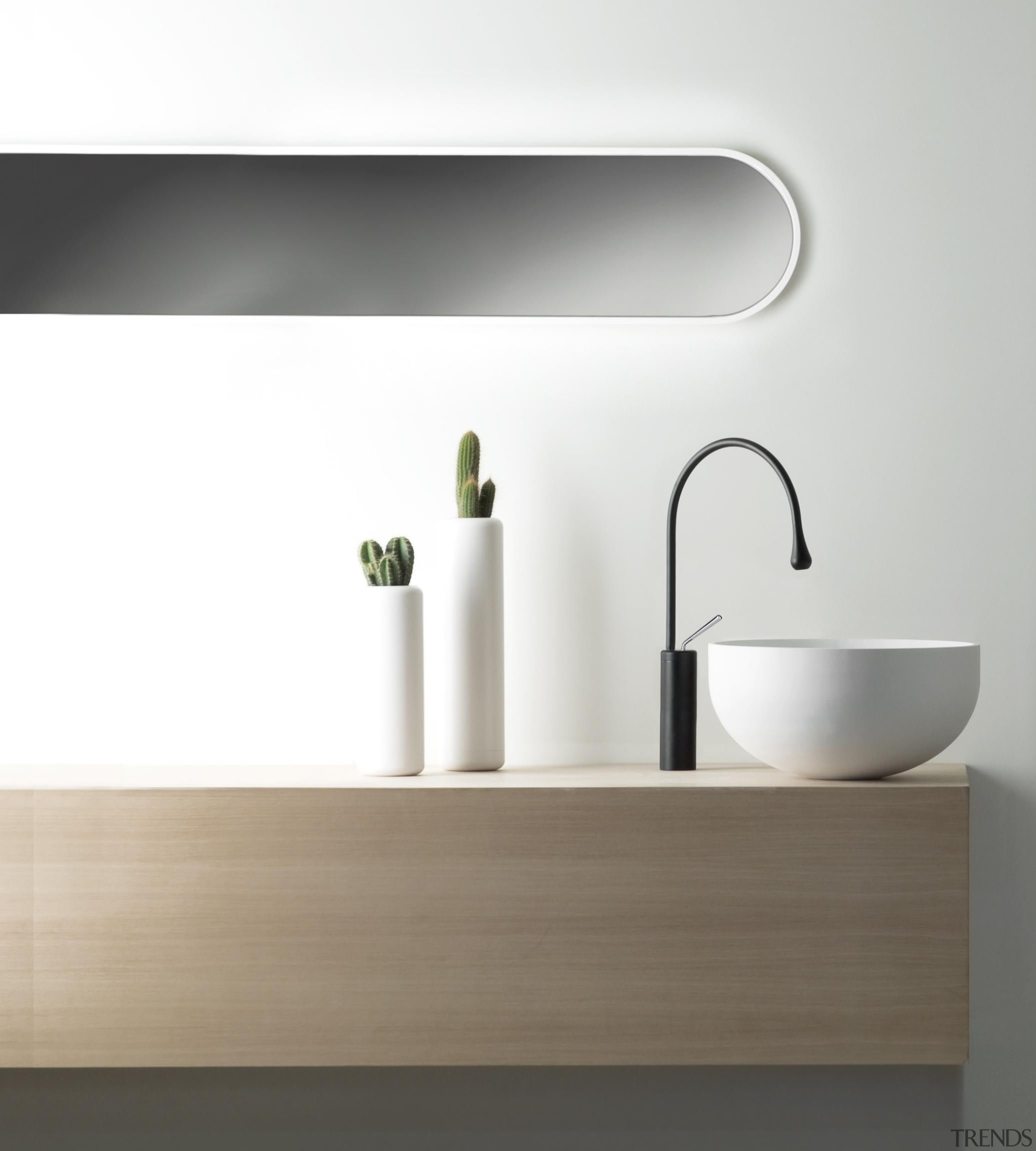 Juxtaposed with a black Goccia faucet, the white angle, bathroom, bathroom sink, ceramic, plumbing fixture, product design, sink, tap, white, gray