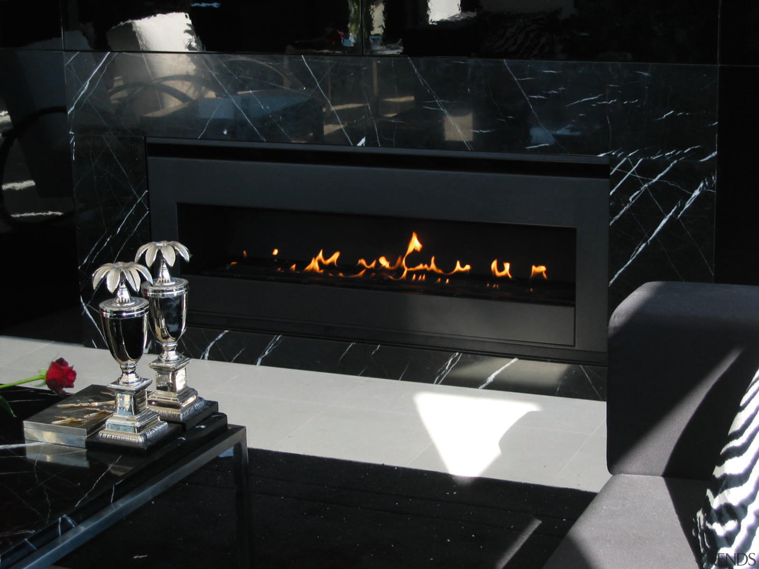 Gas fireplace with black surround. - Gas fireplace fireplace, black