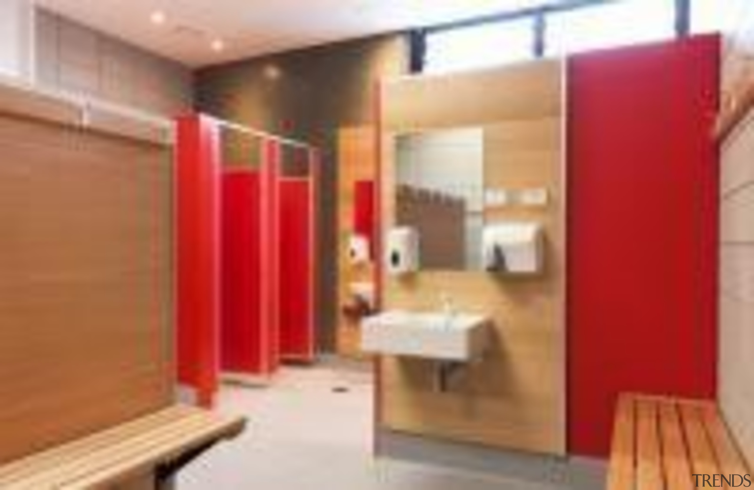 Changing room at St Mary's College Designed by floor, interior design, property, real estate, room, wood, orange, red