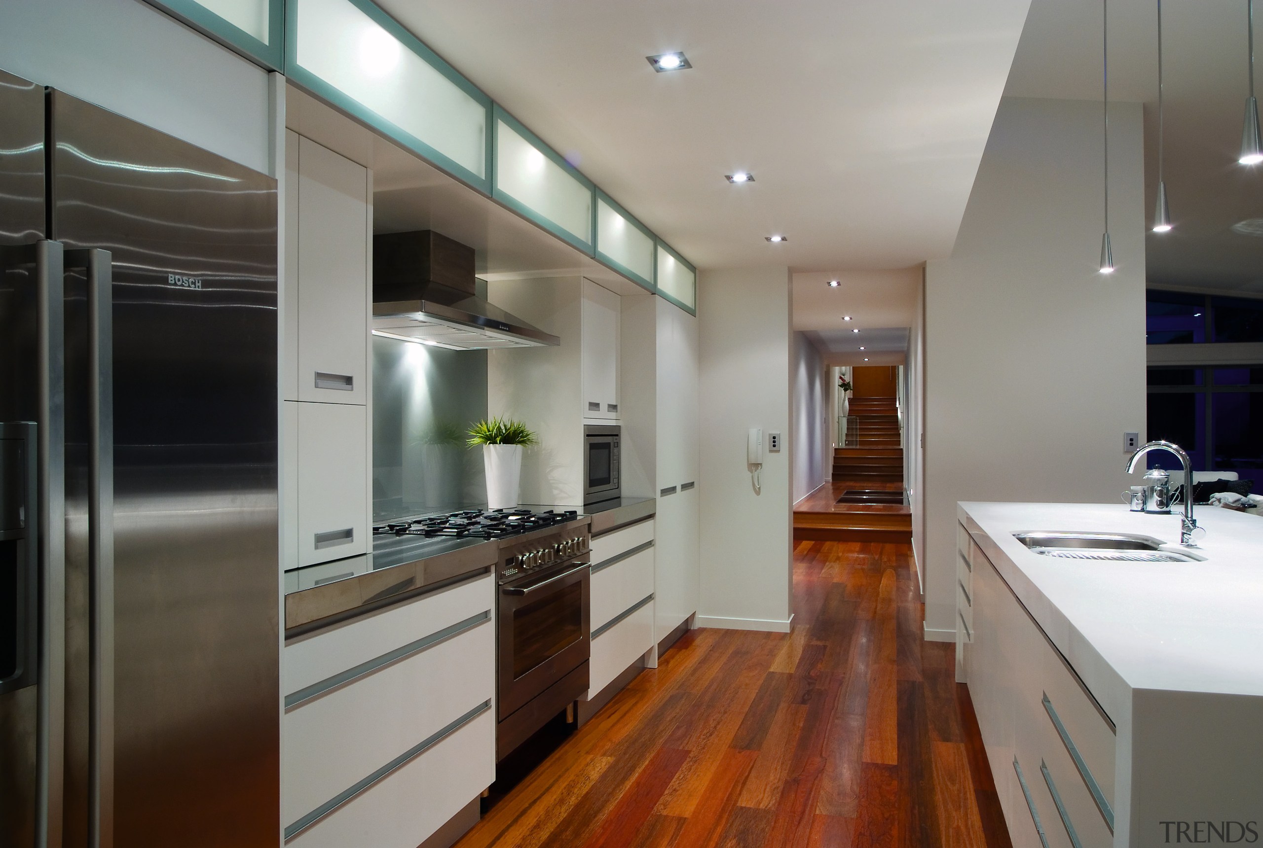 A view of this kitchen featuring polished timber cabinetry, ceiling, countertop, interior design, kitchen, real estate, room, gray