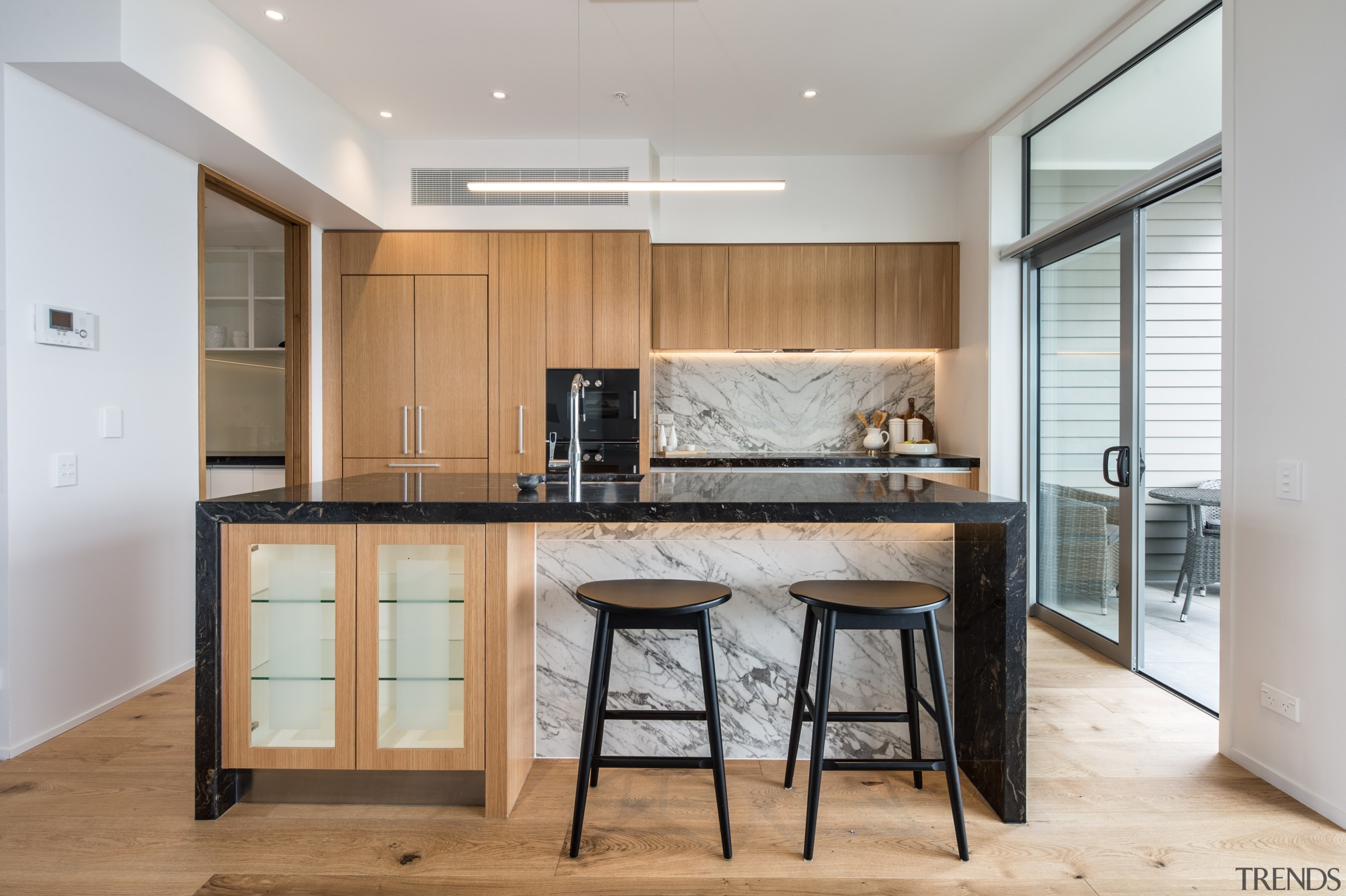 Kitchen featuring Gaggenau appliances and marble benchtops cabinetry, countertop, cuisine classique, floor, interior design, kitchen, real estate, room, gray