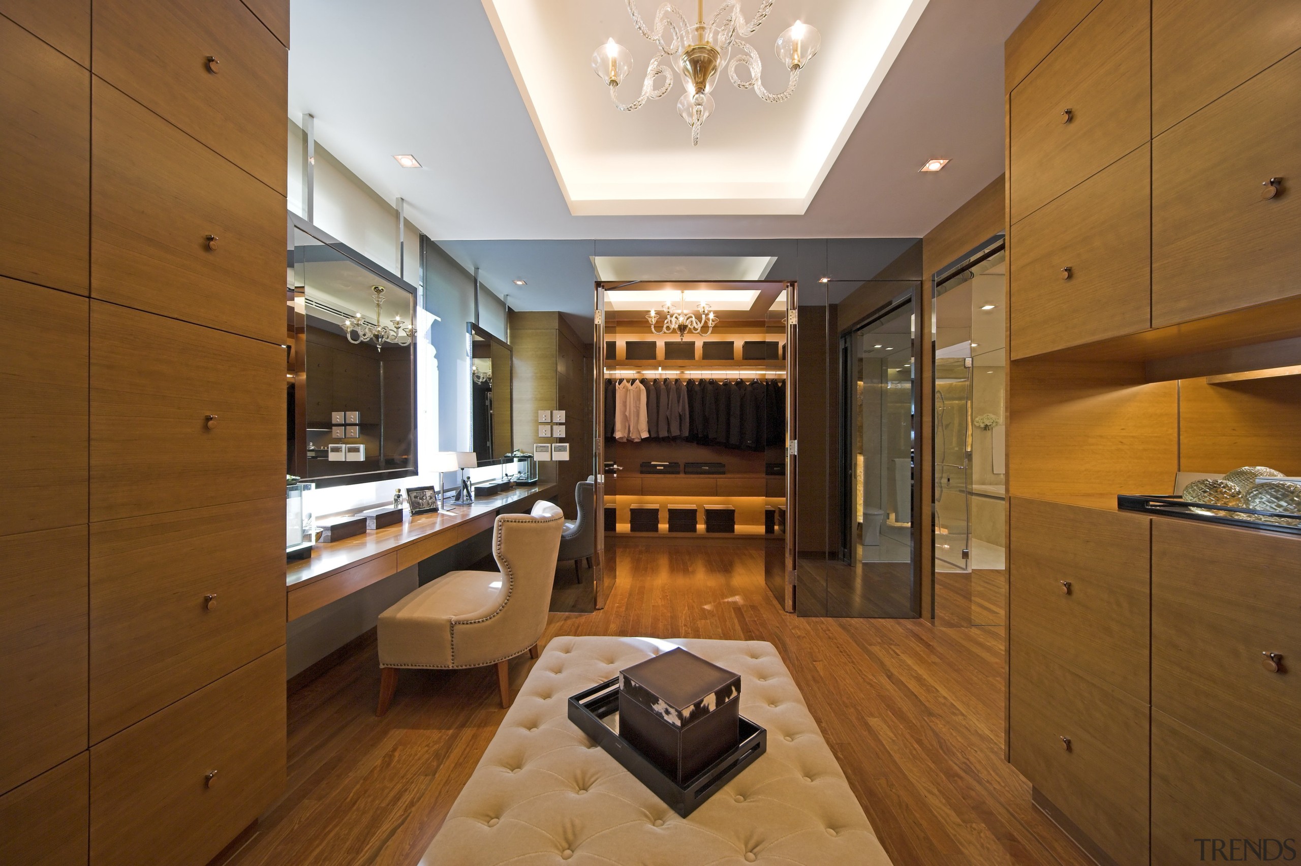 Master suite in a Hong Kong waterside apartment.Featuring architecture, cabinetry, ceiling, estate, floor, flooring, hardwood, interior design, kitchen, living room, lobby, real estate, room, wood, wood flooring, brown