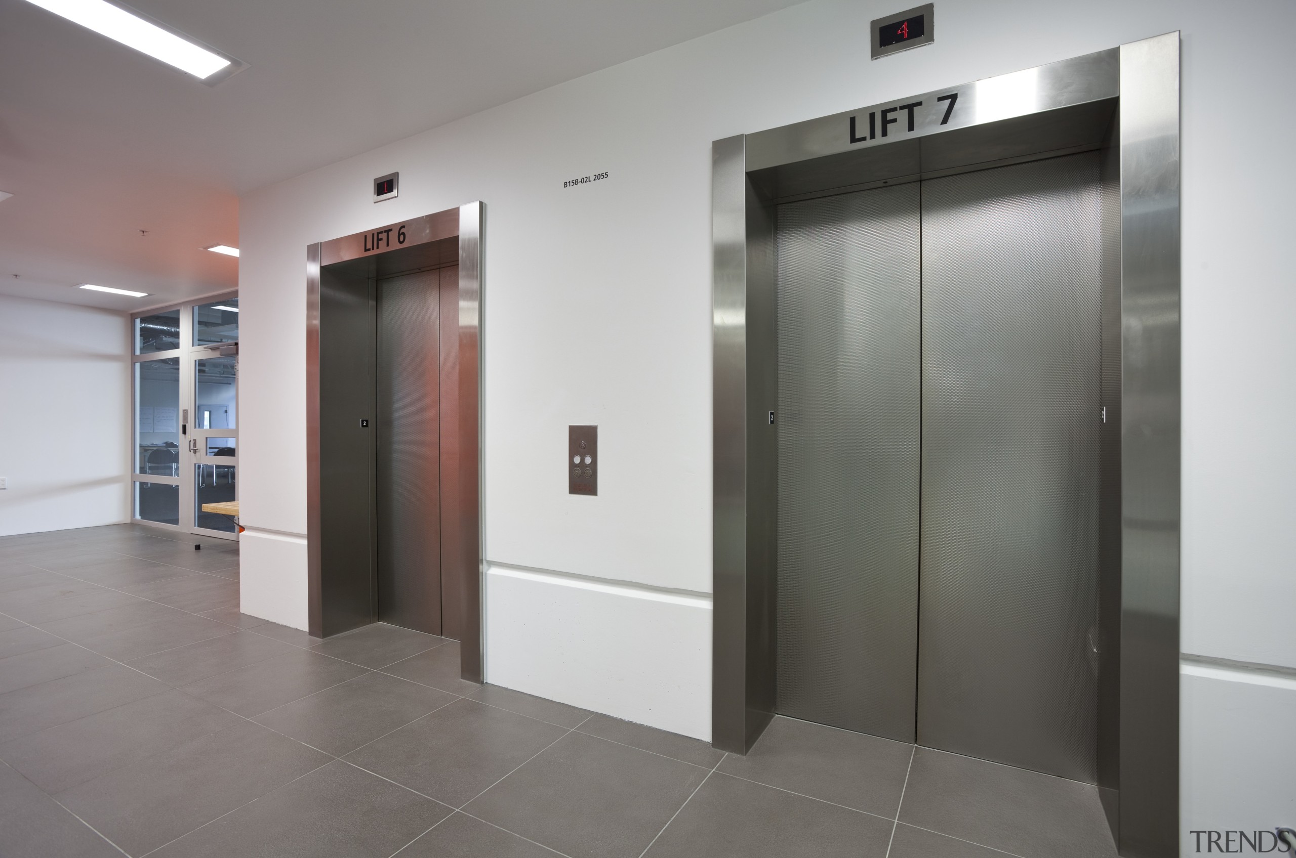 View of steel features at Mt Eden prison door, elevator, floor, flooring, lobby, property, real estate, gray