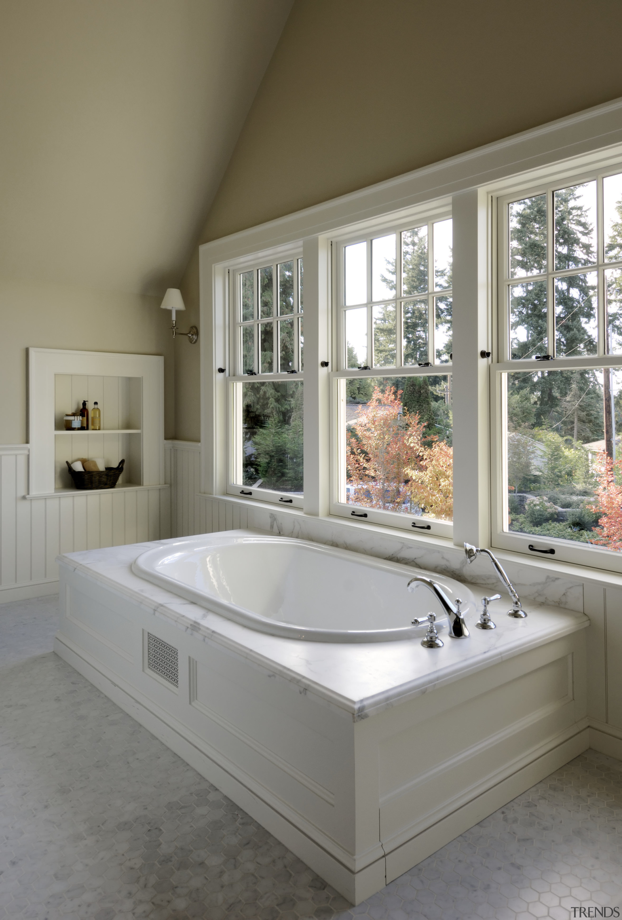 Image of the Bathroom, featuring a white bathtub bathroom, bathtub, home, interior design, plumbing fixture, sink, window, gray