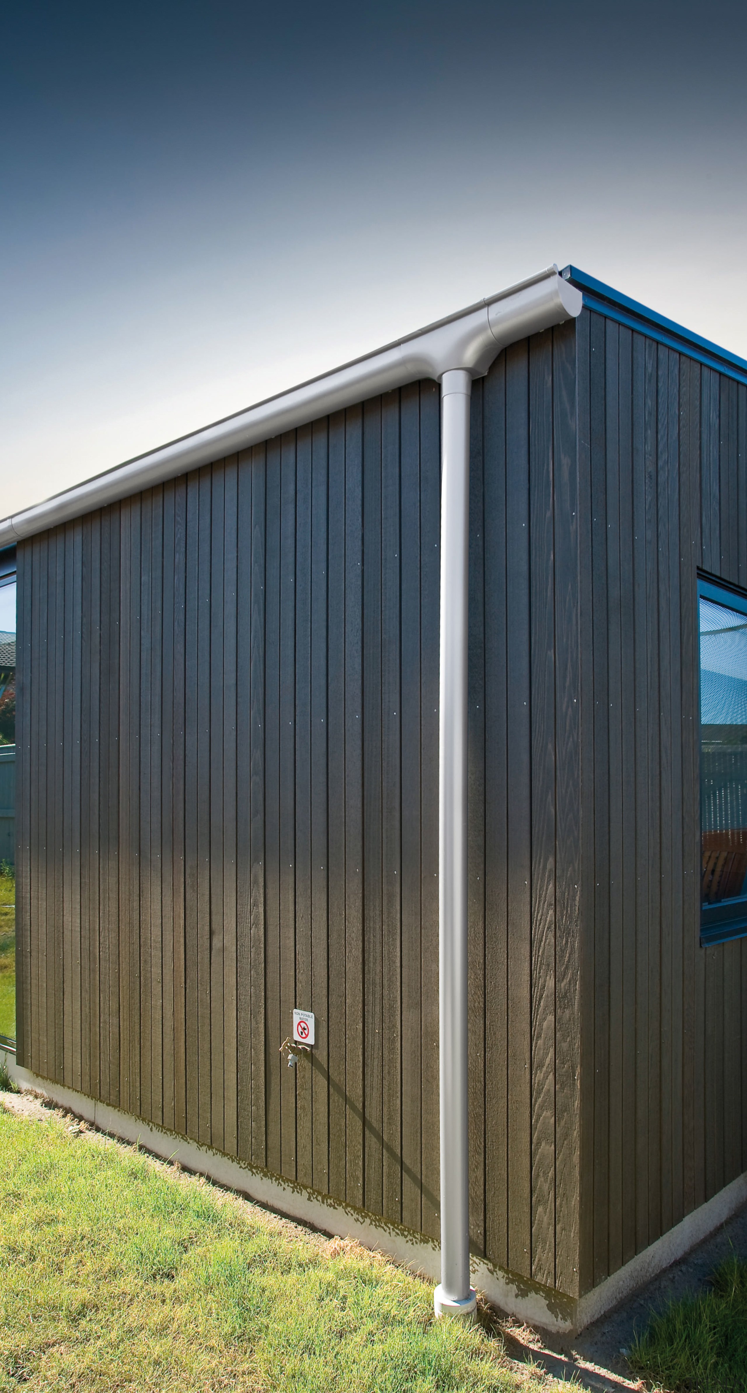 View of spouting and drainpipe system. - View architecture, building, facade, garage, garden buildings, house, real estate, shed, siding, structure, black