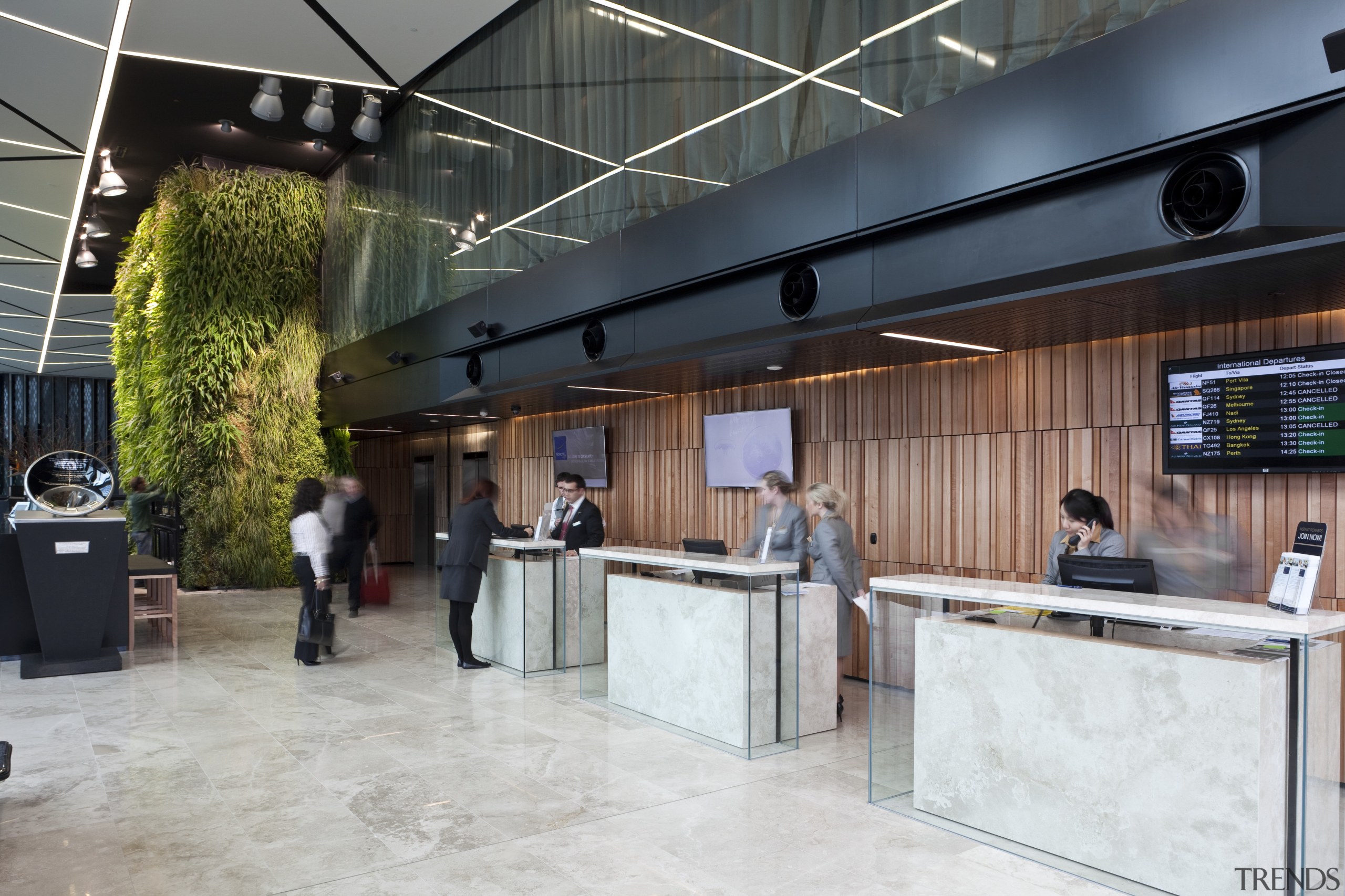 View of public reception at the Novotel Auckland interior design, lobby, gray, black