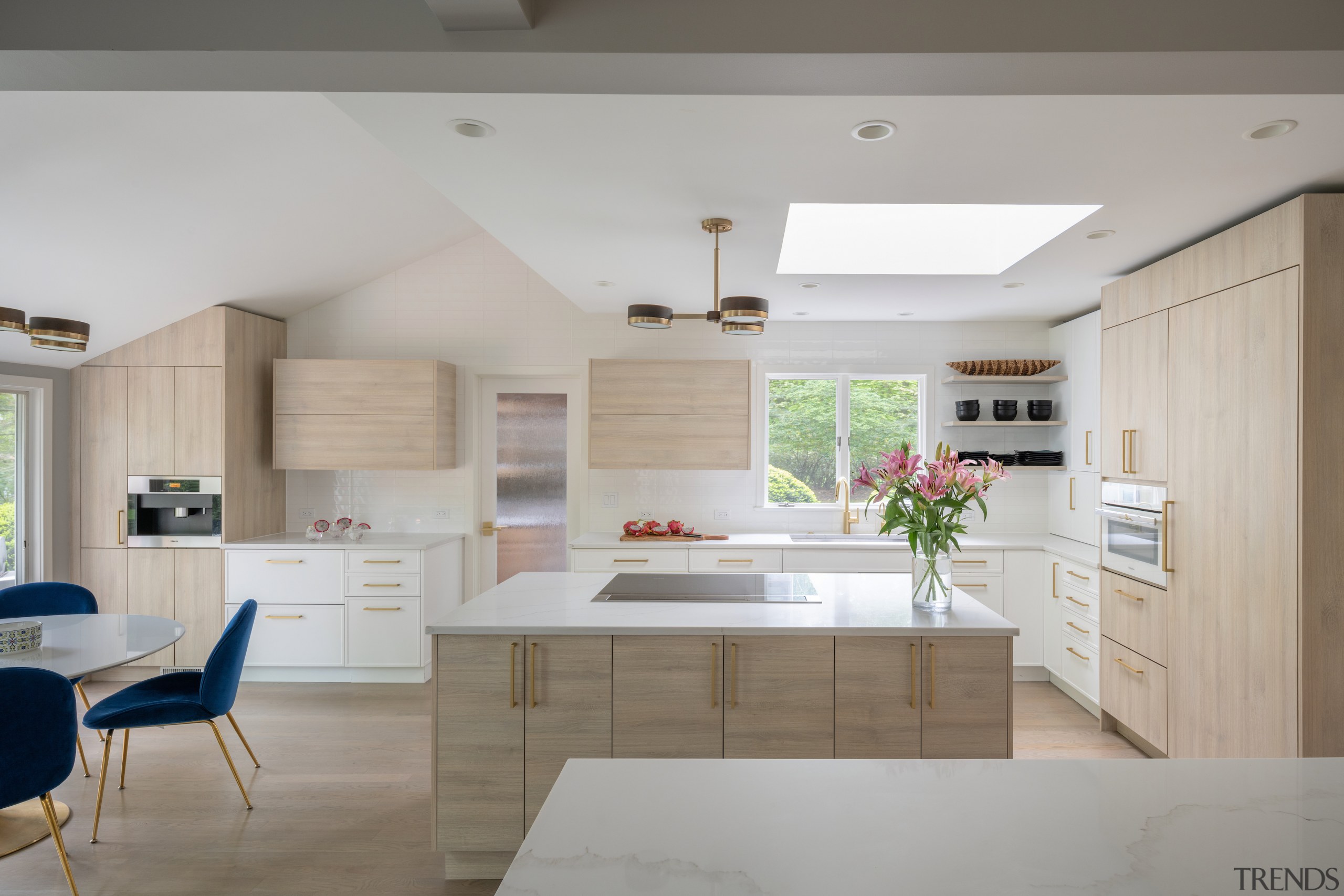 The skylight adds to the kitchen's light, breezy 