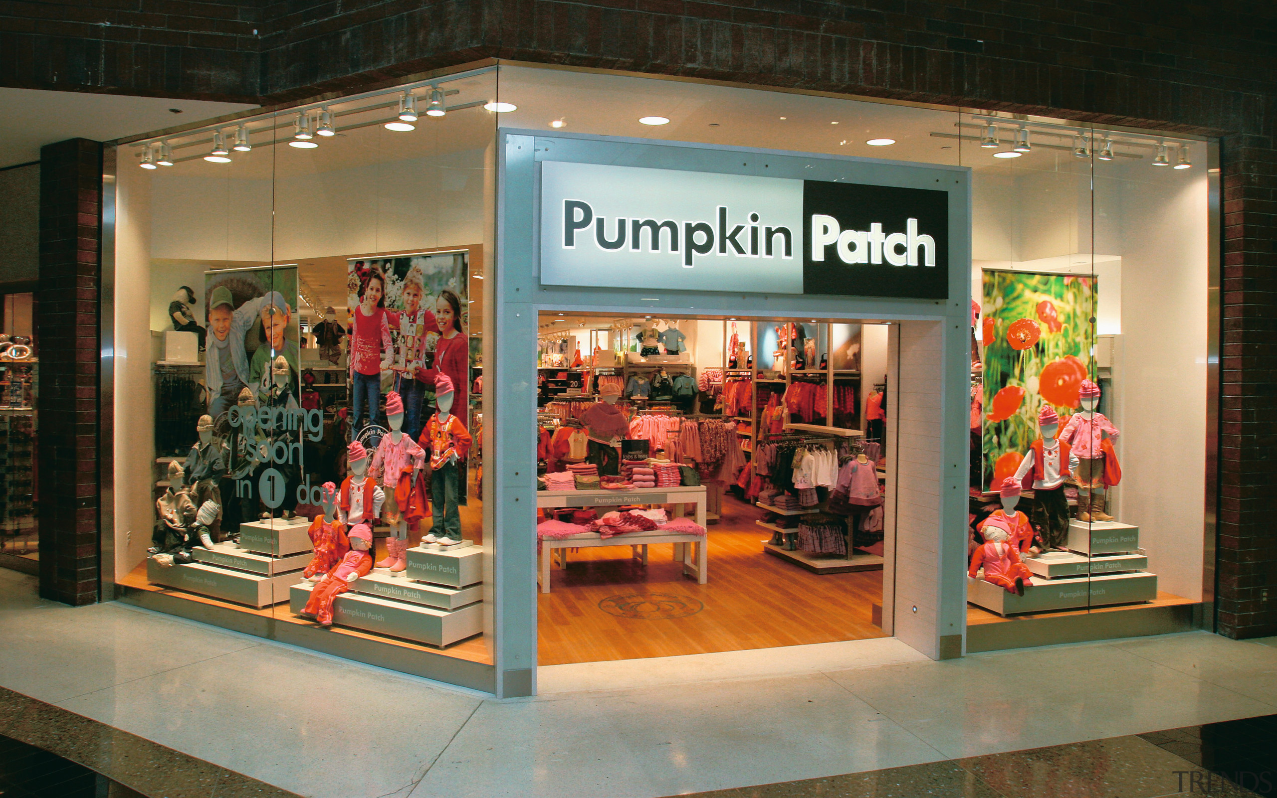 view of the pumpkin pathc store designed by boutique, display case, display window, exhibition, outlet store, retail, brown, black