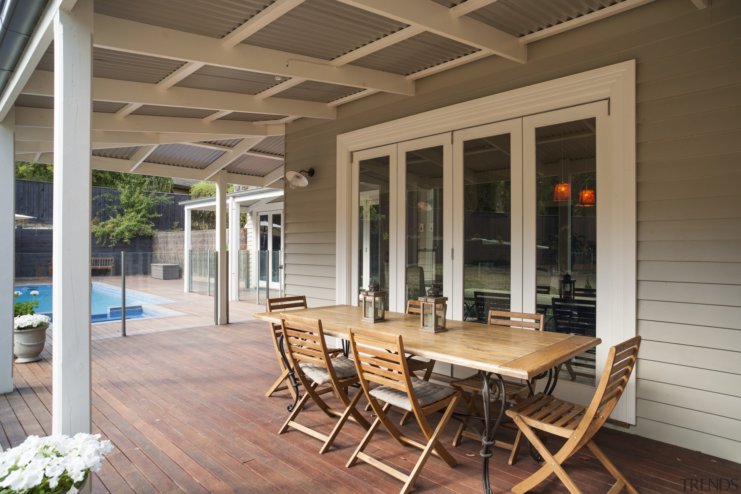 Bifolding doors pull back to connect this open-plan deck, door, estate, floor, flooring, house, interior design, outdoor structure, patio, porch, real estate, window, wood, brown, gray