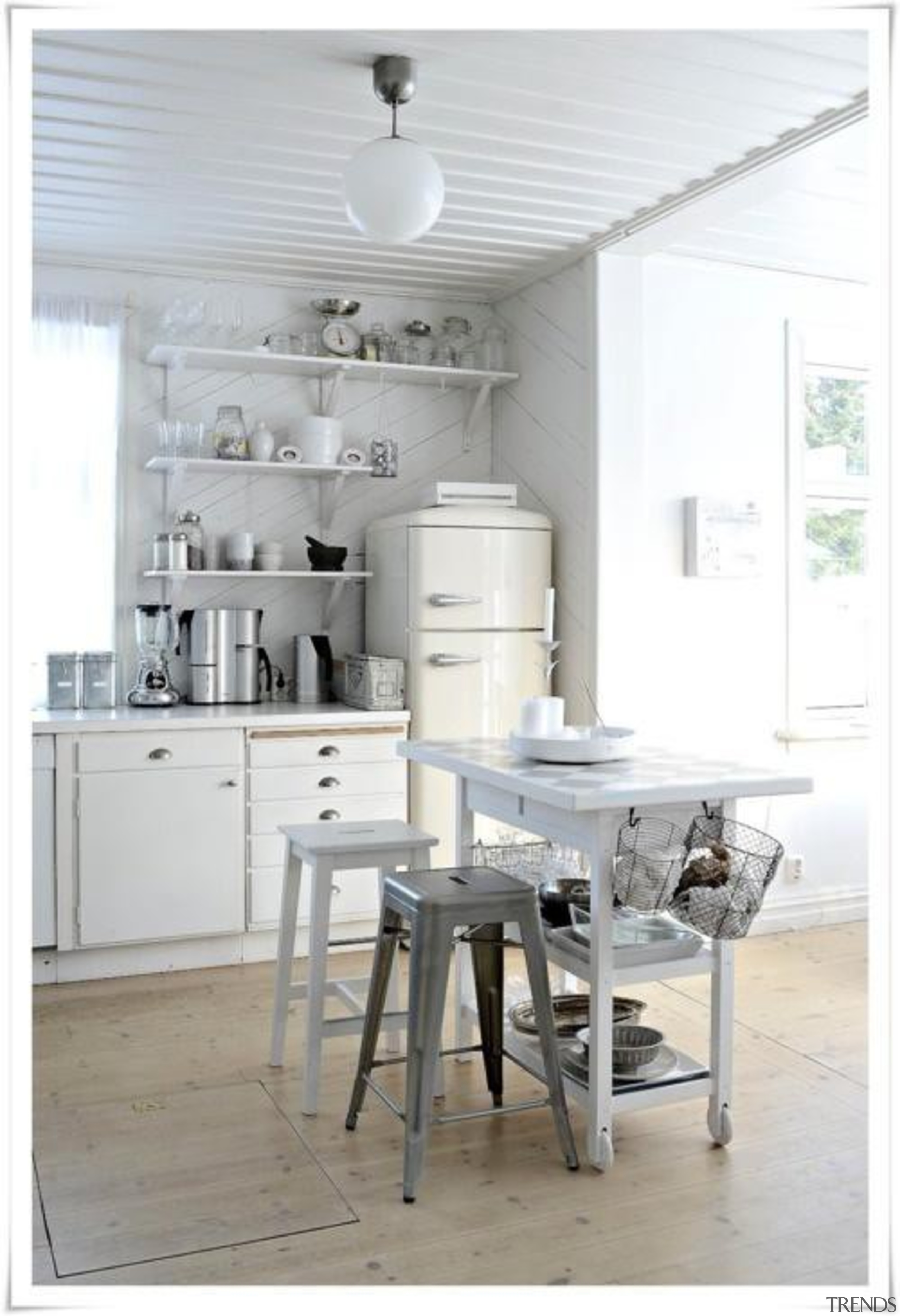 This cream Smeg fridge add just hint of chair, cuisine classique, floor, furniture, home, interior design, kitchen, product design, room, table, white