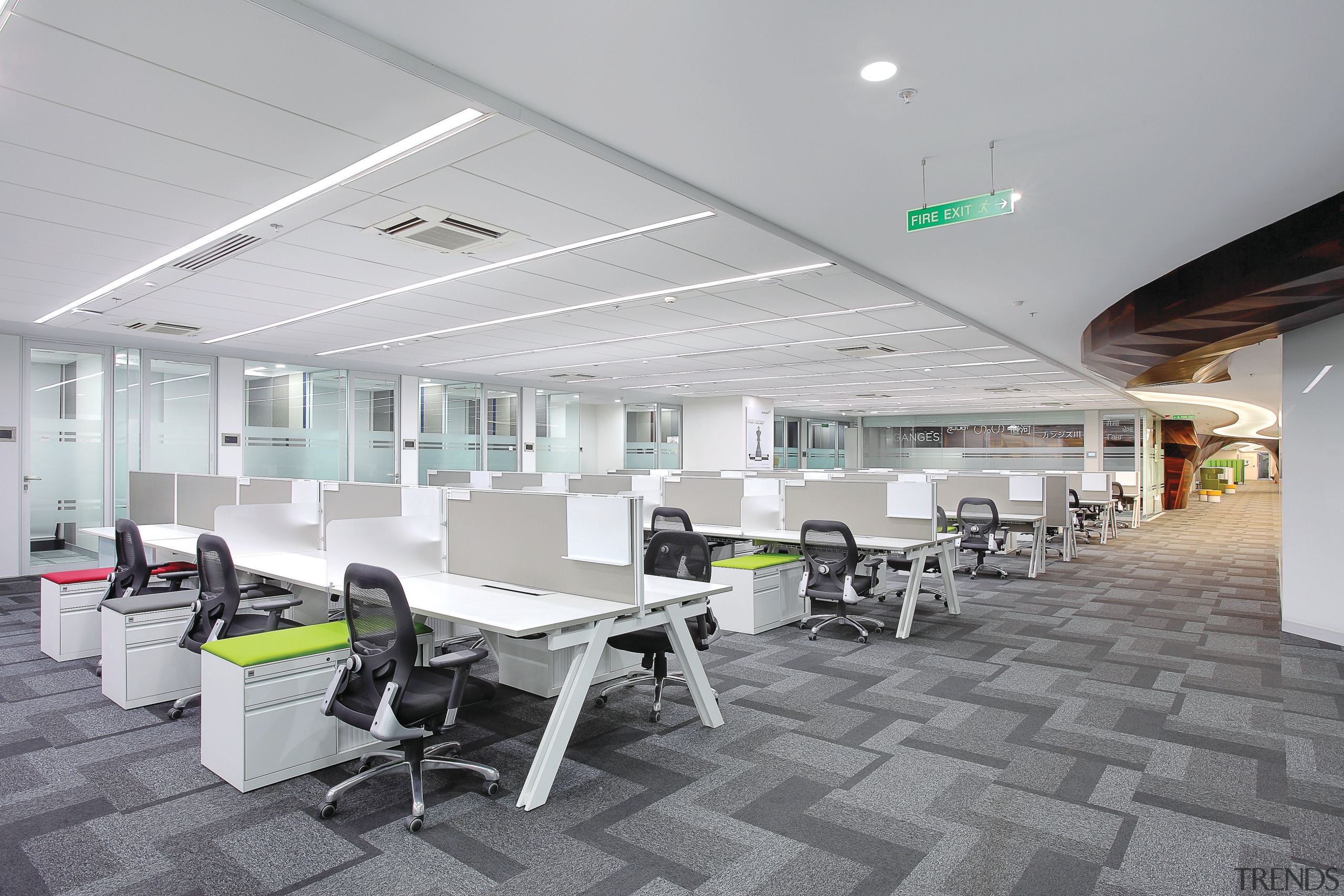 The monochromatic grey and white staff workstations in architecture, ceiling, daylighting, interior design, office, gray