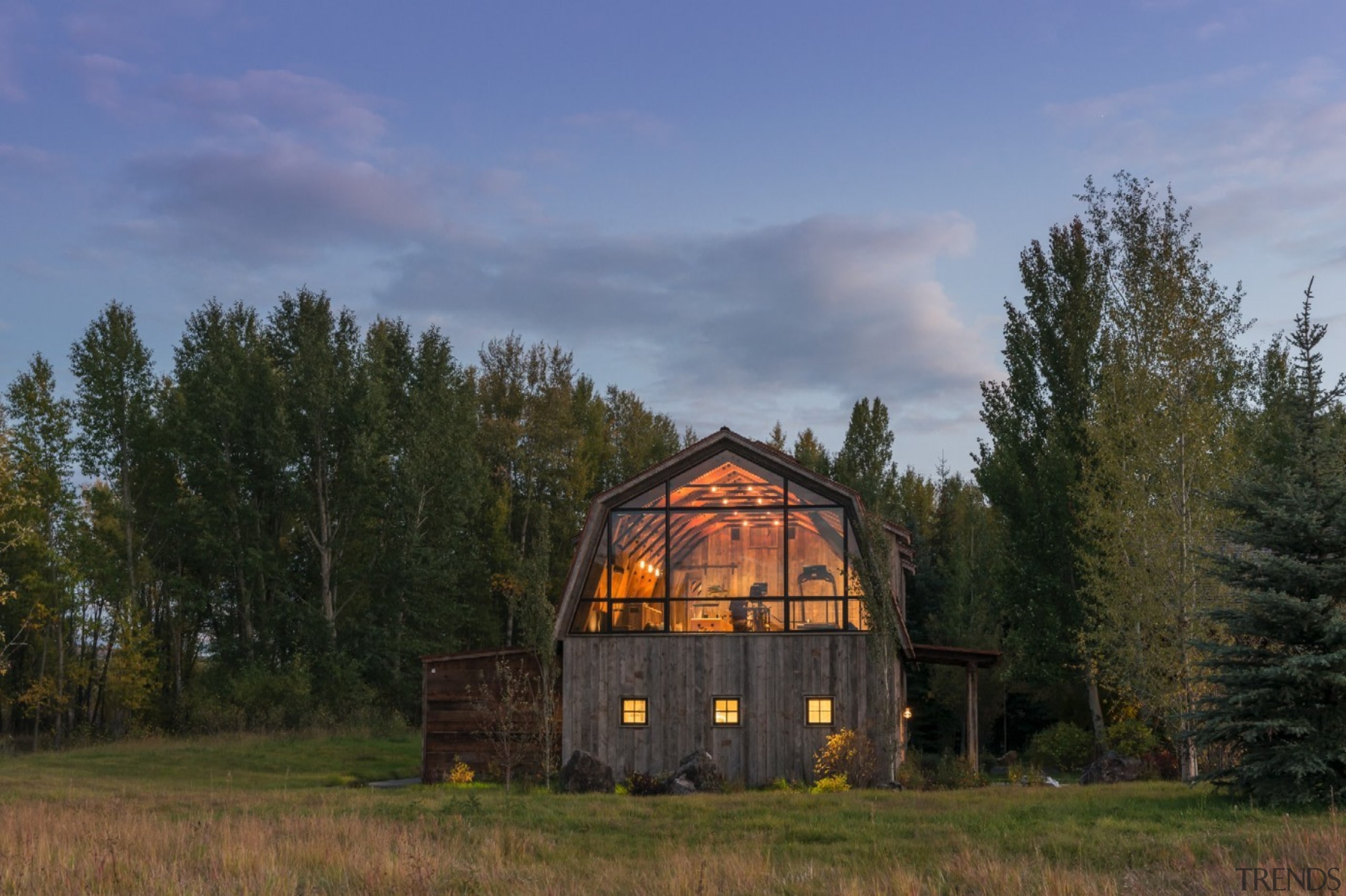 It's still clear you're looking at a barn barn, cloud, cottage, farm, farmhouse, field, grass, home, house, hut, landscape, log cabin, meadow, prairie, property, real estate, rural area, shack, sky, tree, brown, blue